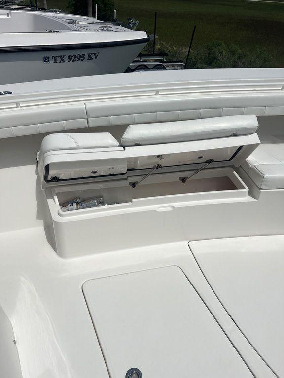 2021 Regulator 41 boat with open storage compartment on deck.