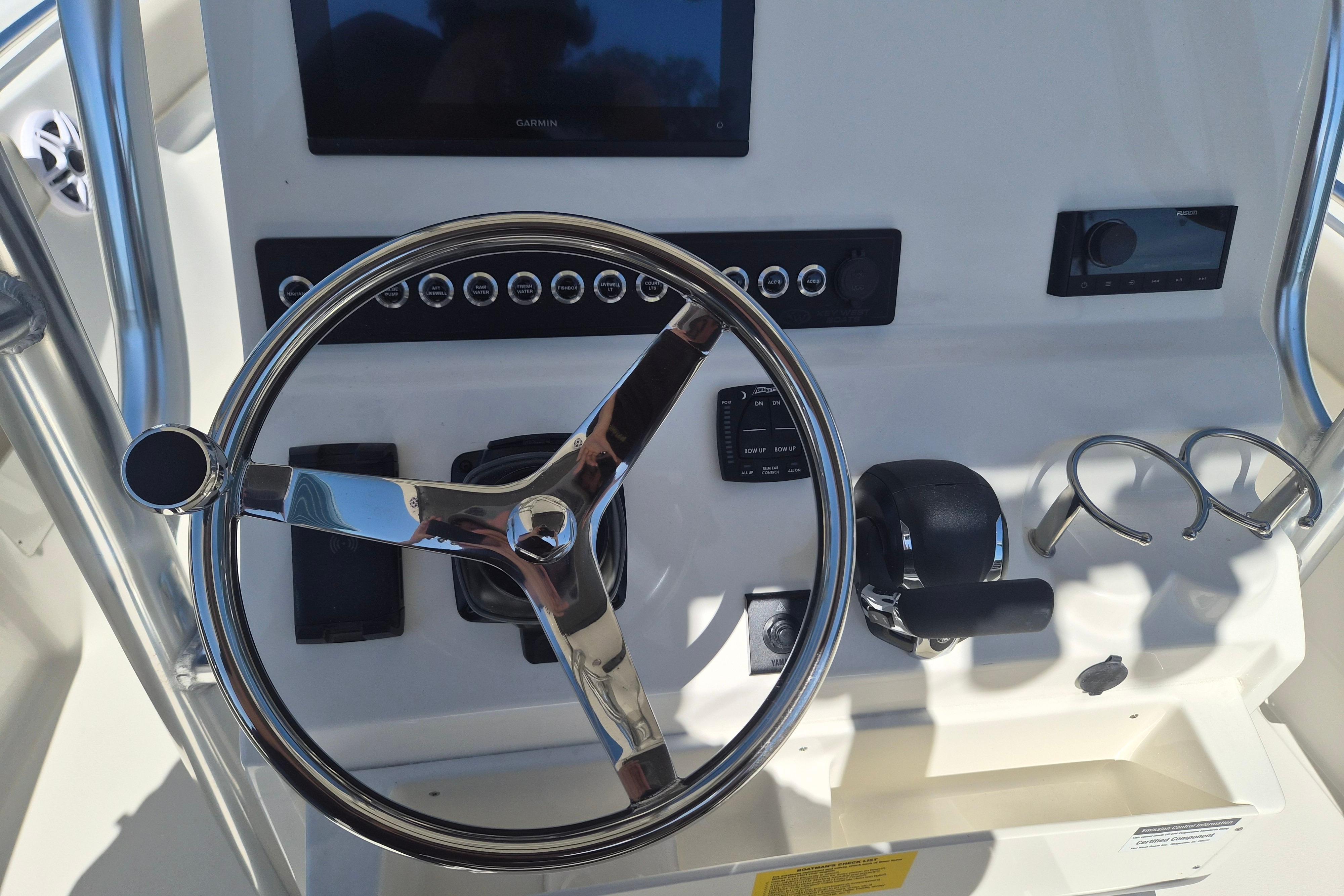 Steering console of 2026 Key West 239 FS boat with modern controls and displays.
