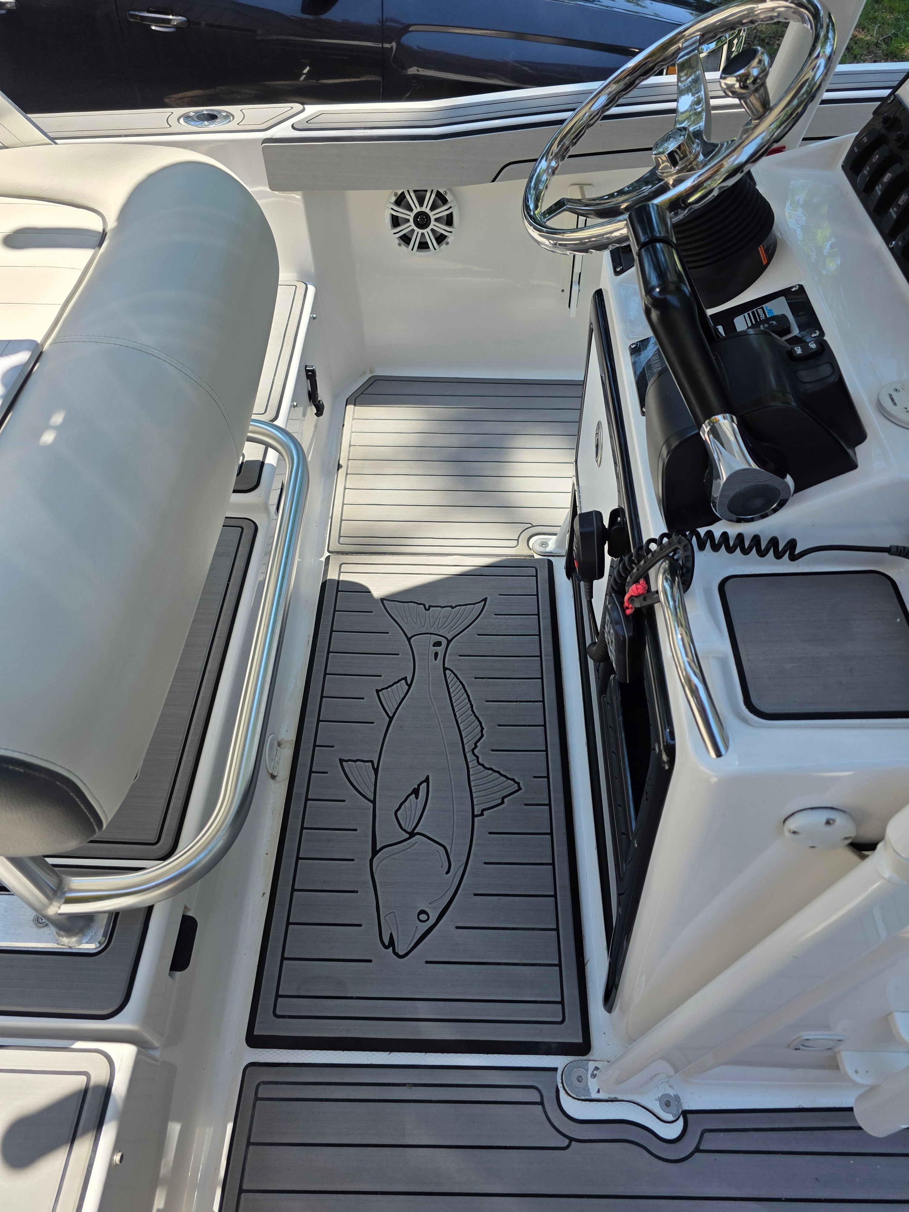 Interior of a 2020 Yamaha 210 FSH Sport boat.