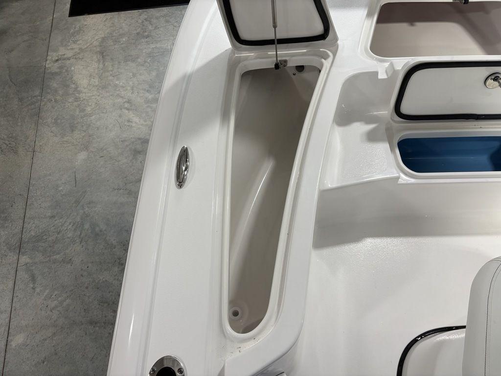 2026 Tidewater 2110 BM boat interior storage compartments and seating area.