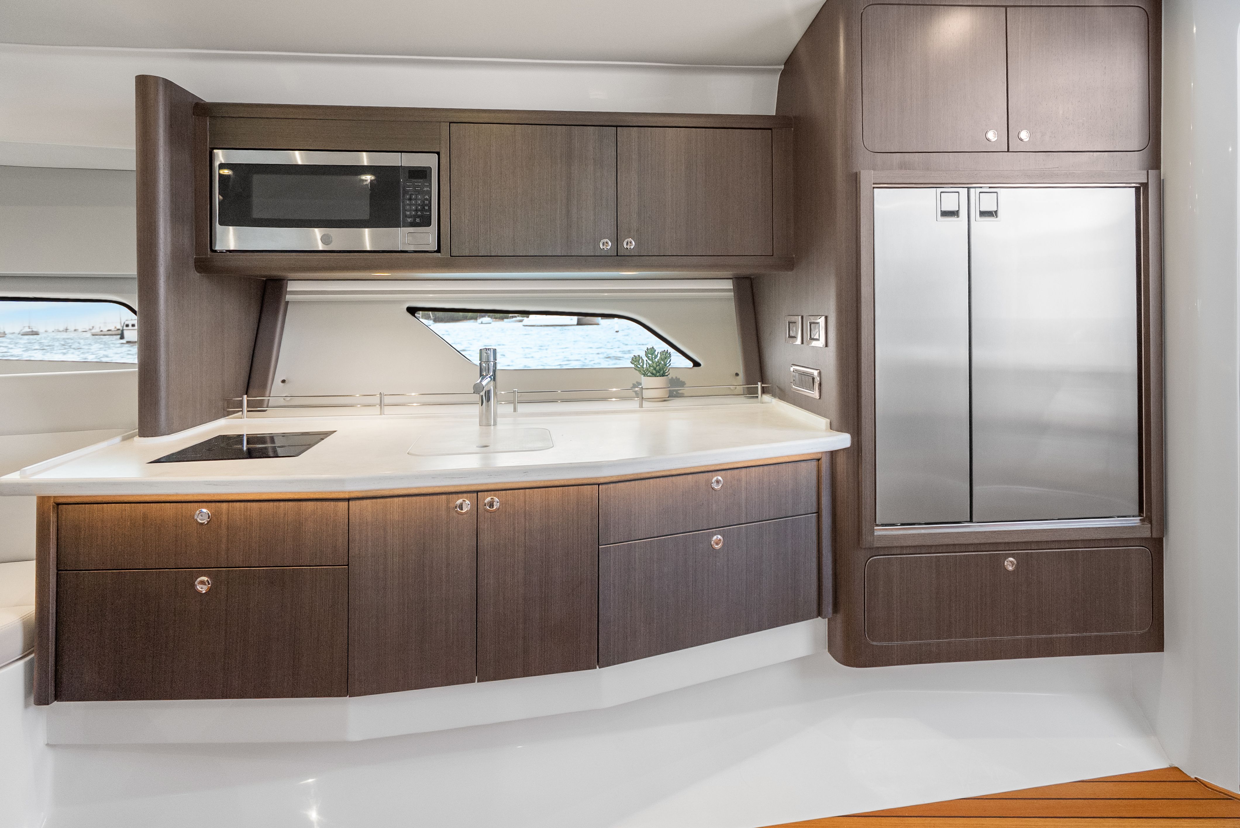 Modern kitchen on the 2024 Intrepid 477 Evolution yacht.