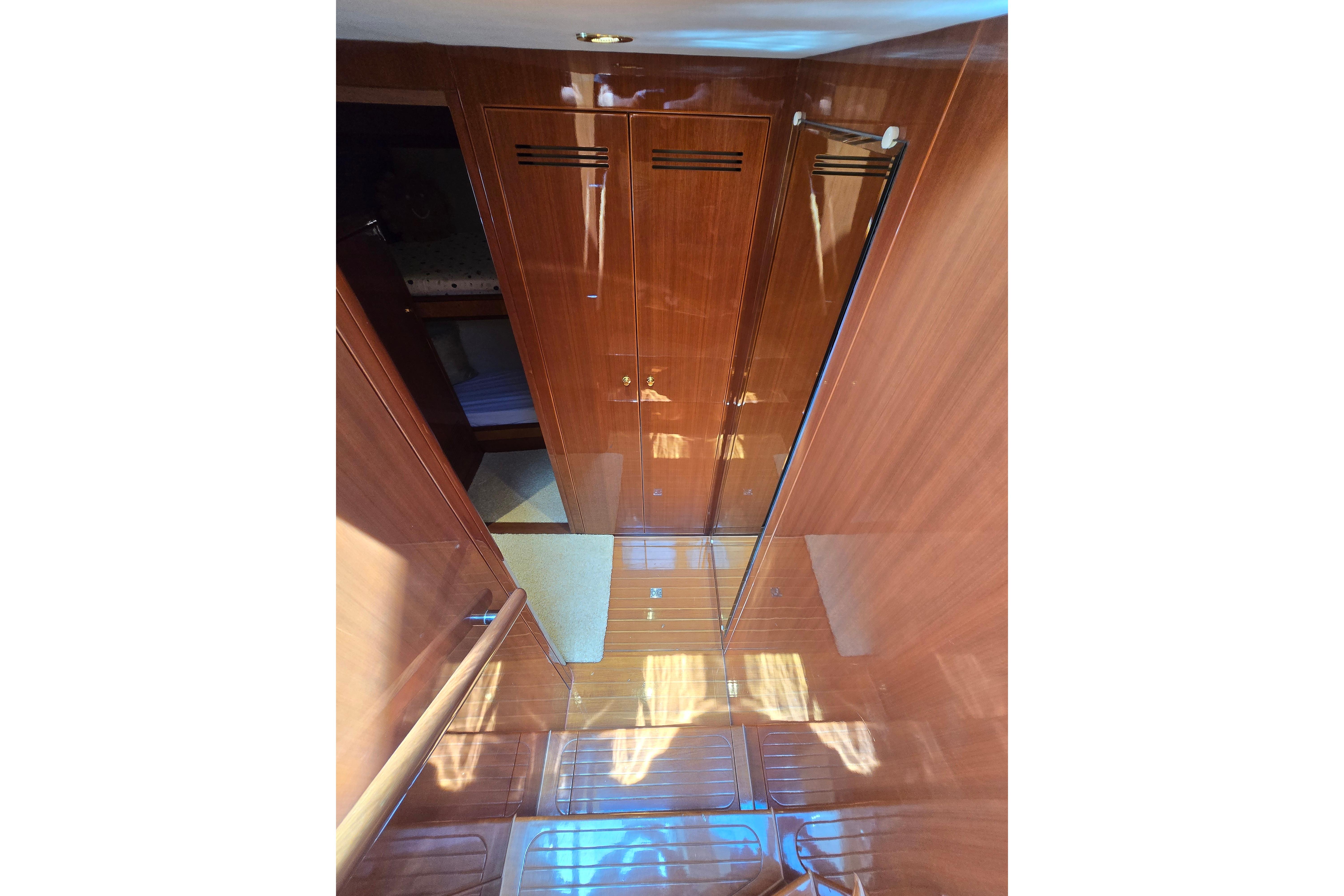 Luxurious wooden interior of 2004 Grand Harbour 58 yacht hallway.
