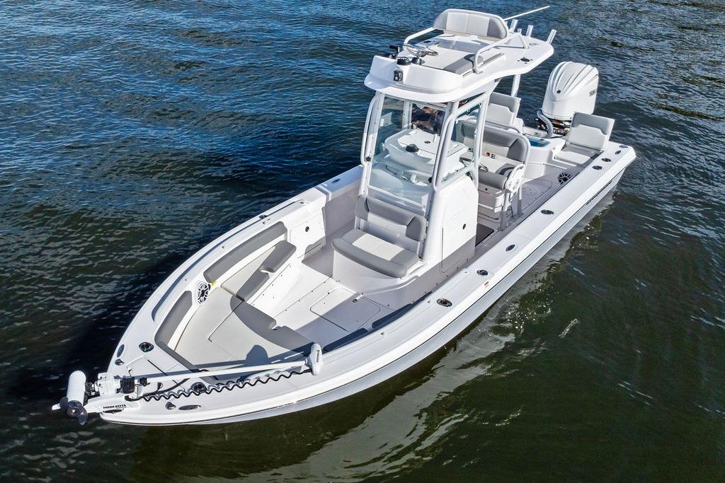 2023 Everglades 243 Center Console boat on water, showcasing sleek design and modern features.