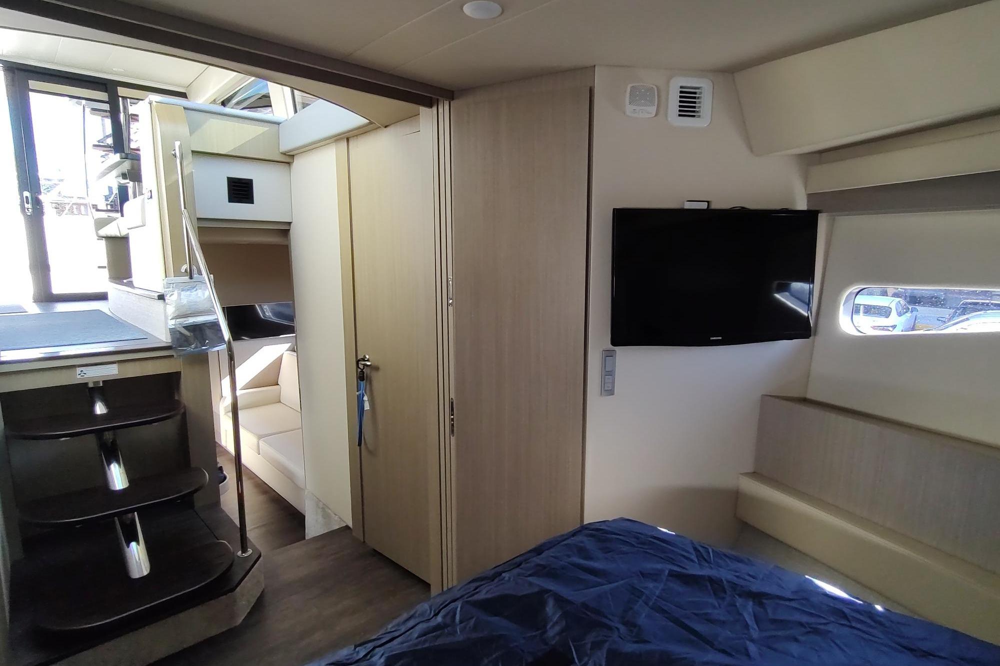Interior of 2021 Regal 42 Fly yacht with modern design and cozy furnishings.