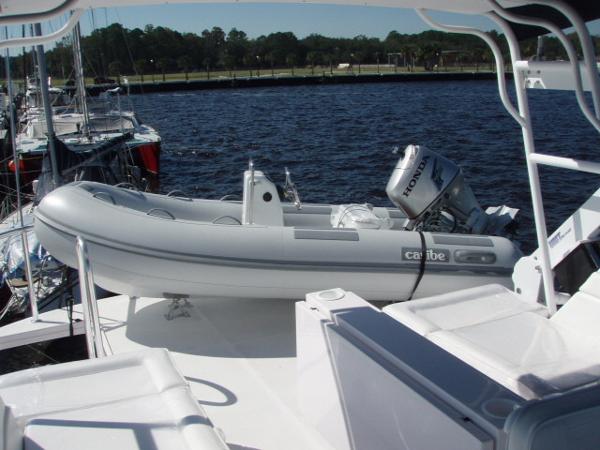 2025 Great Harbour N40 yacht with inflatable dinghy and Honda outboard motor.