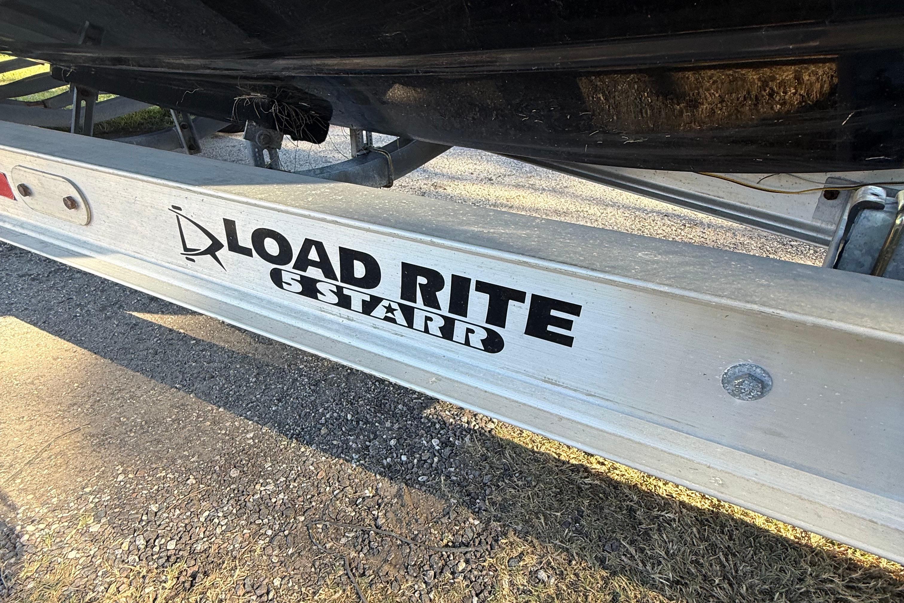 Load Rite 5 Star trailer with 2021 Carolina Skiff 26 Ultra Elite boat.