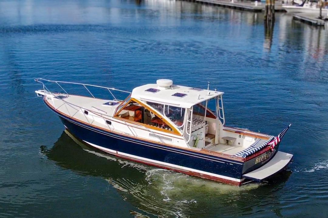 2003 Little Harbor WhisperJet 36 cruising on calm waters.