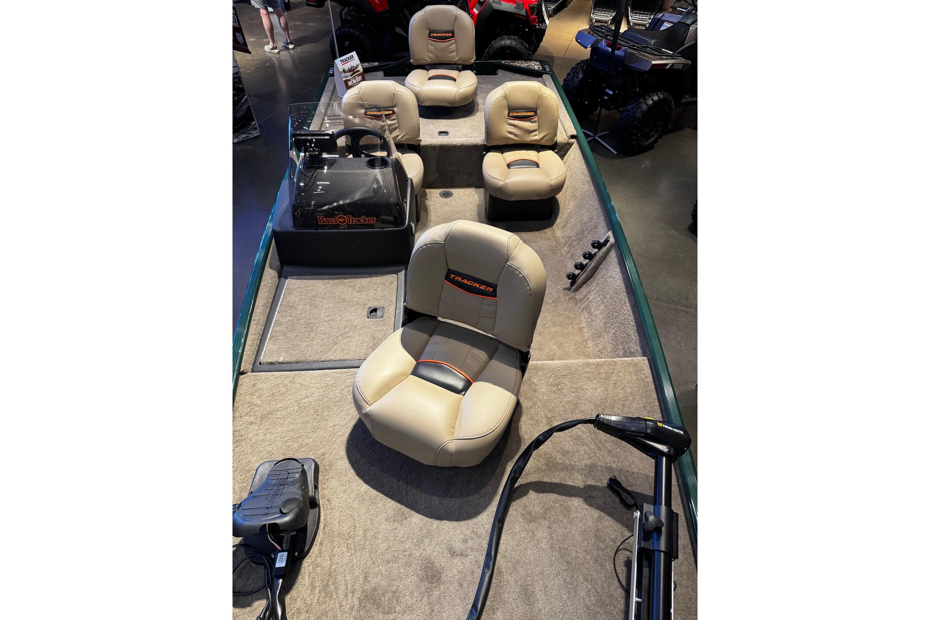 2026 Tracker Bass Tracker Classic Limited boat interior with beige seating and steering console.