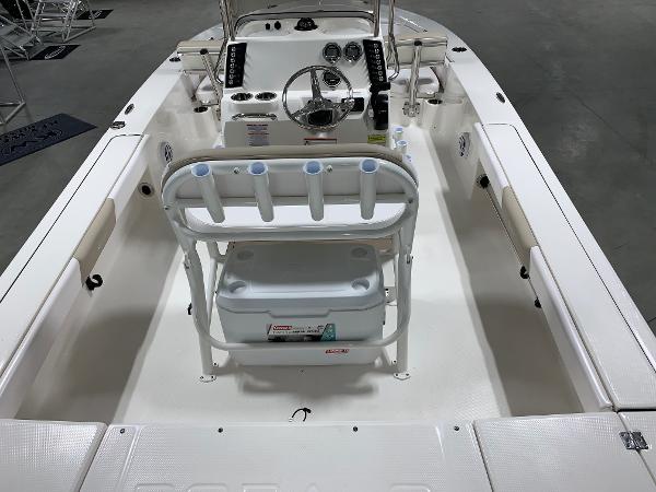 2026 Robalo 226 Cayman boat interior with steering console and seating arrangement.
