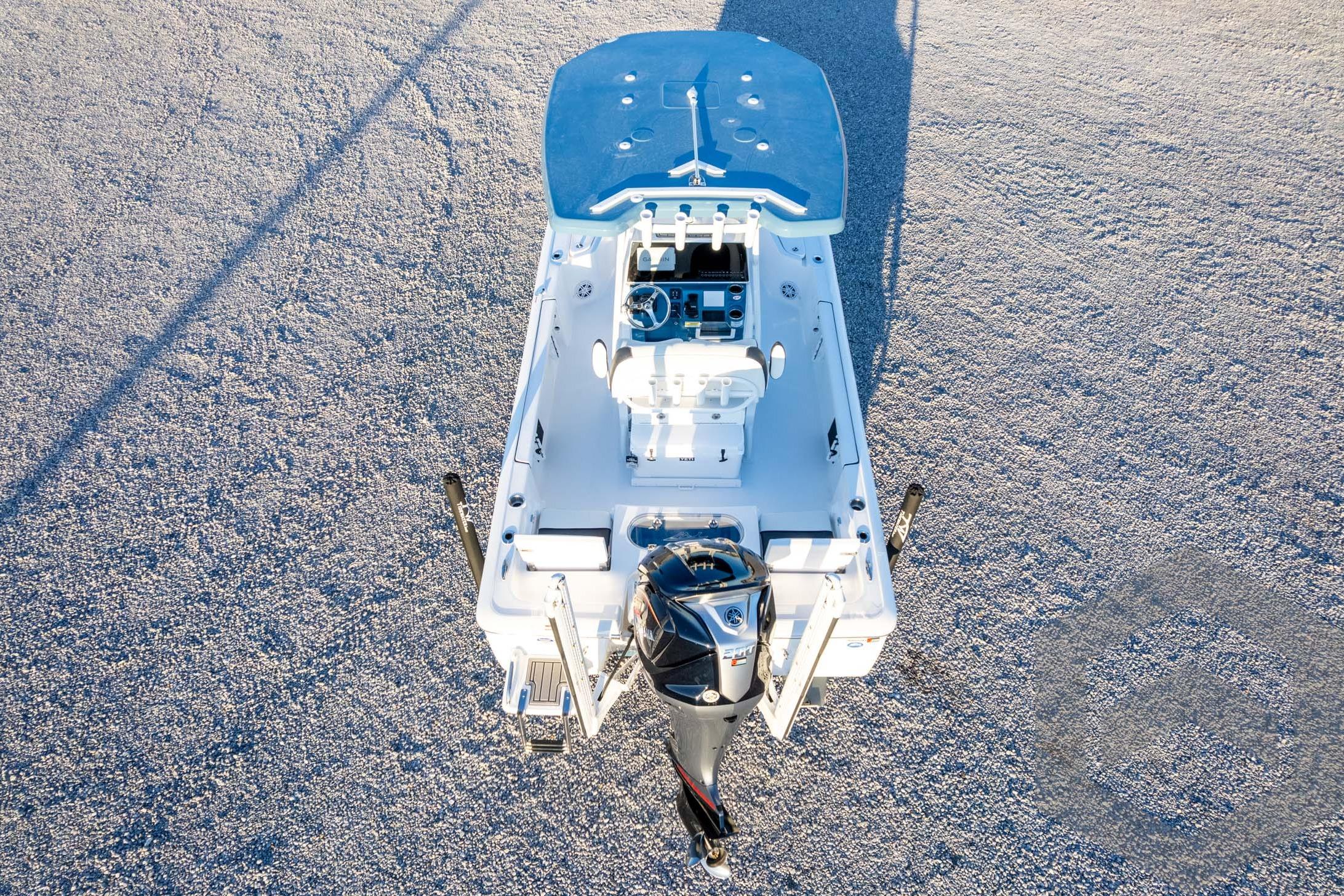 2026 Tidewater 2110 Bay Max boat, aerial view, showcasing deck and motor.