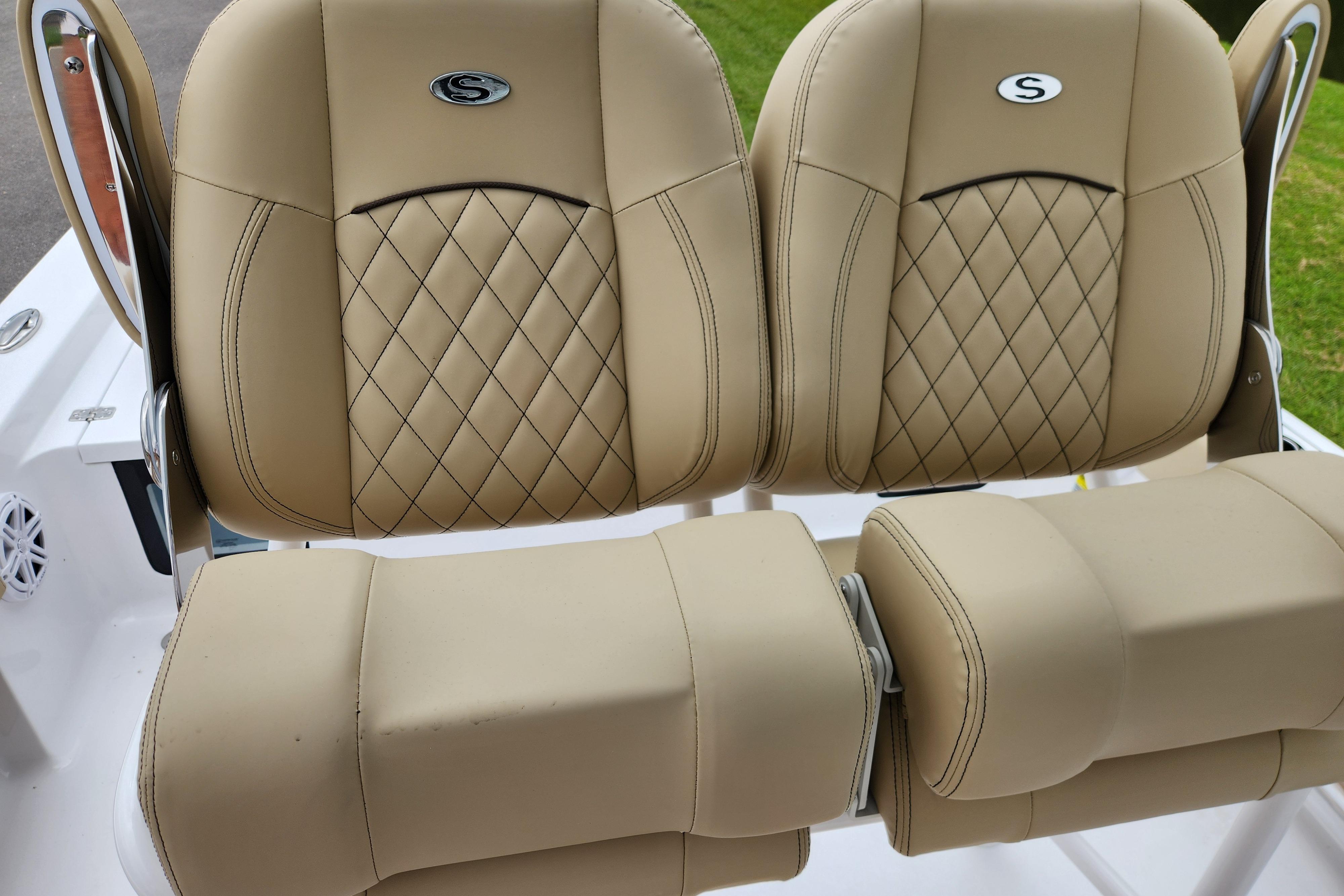 2026 Sportsman Masters 247 Bay Boat tan leather seats with diamond stitching.