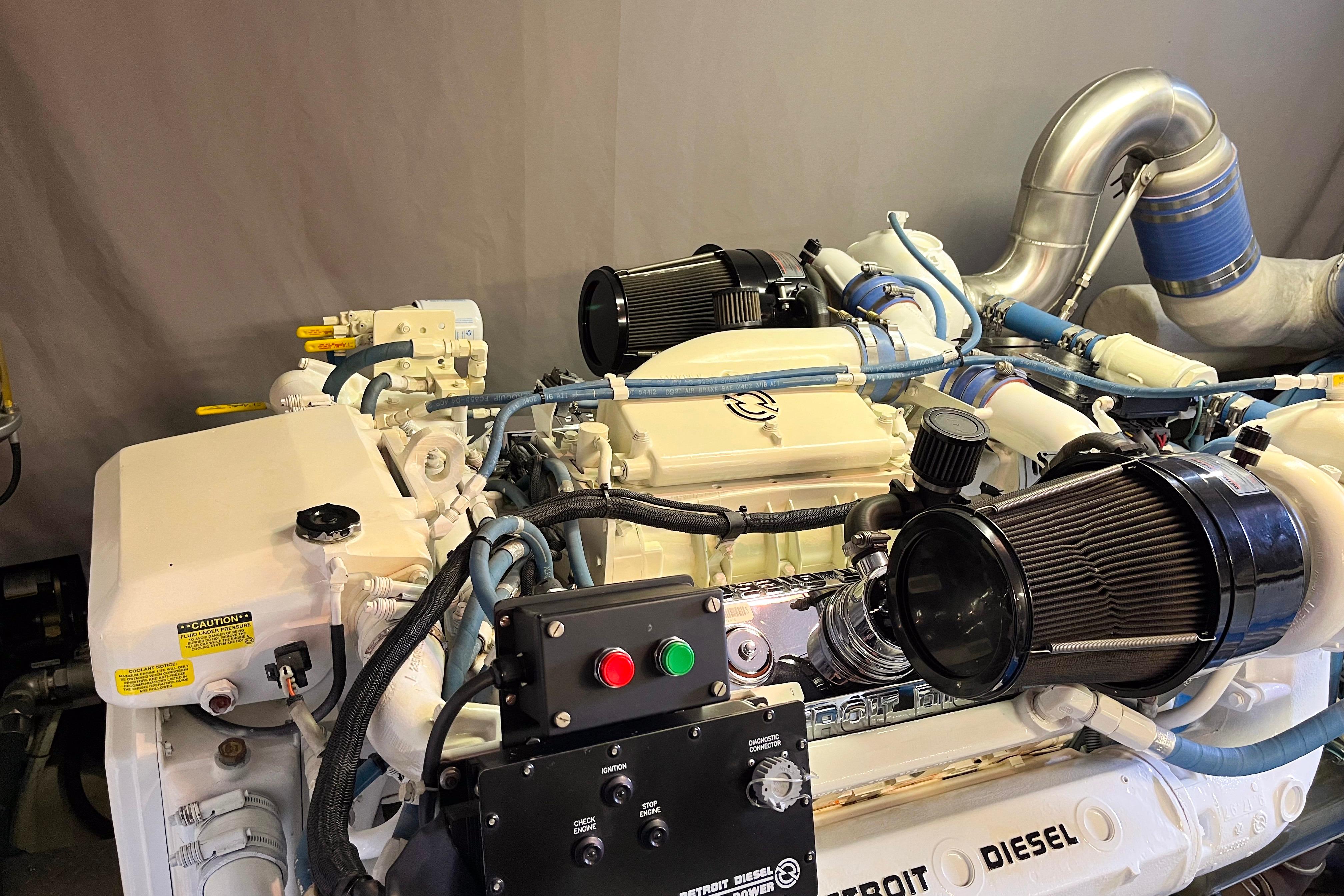 Engine room of a 1999 Wendon Skylounge 630 yacht, featuring a Detroit Diesel engine.