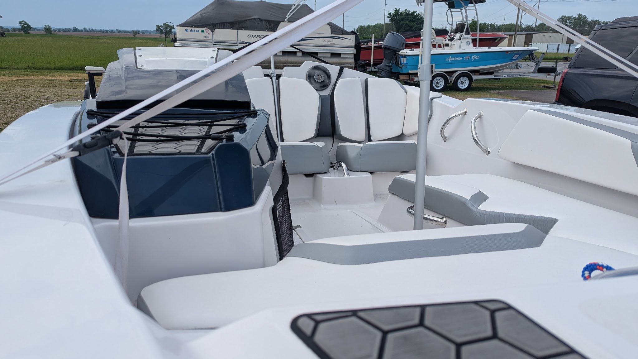 Interior of a 2017 Scarab 165 H.O. boat, modern and stylish.