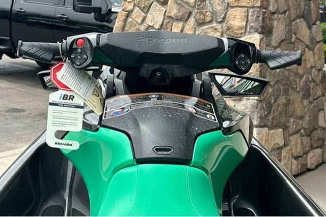 2026 Sea-Doo PWC GTR 230 with green seat and black handlebars.