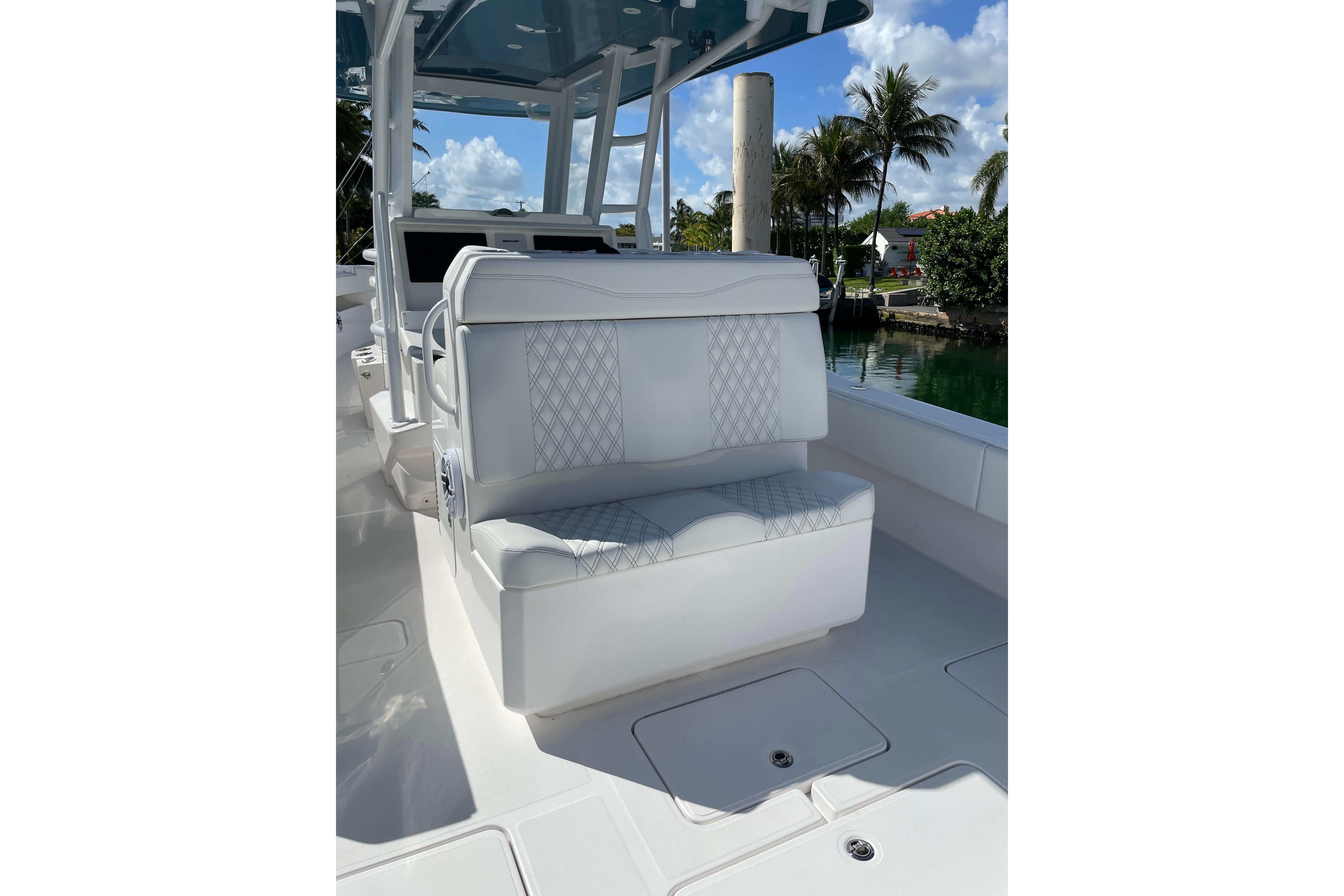 2024 Invincible 36 Open Fisherman boat interior with white seating and sleek design.