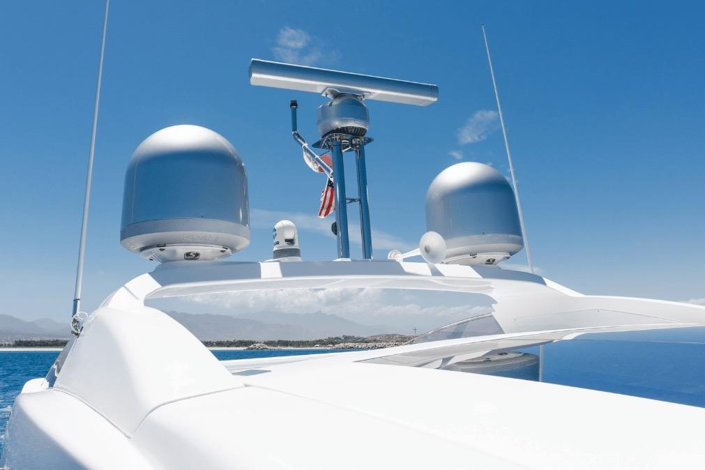 Azimut 60 yacht radar and antennas against clear blue sky, 2020 model.