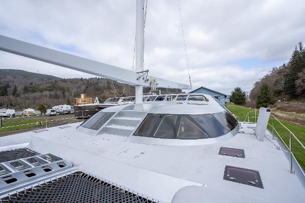 2025 Shuttleworth 52 AeroRig yacht with sleek design and panoramic windows.