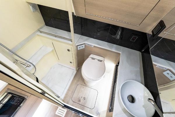 Luxurious bathroom interior of 2025 Scout 425 LXF boat, featuring modern fixtures and sleek design.