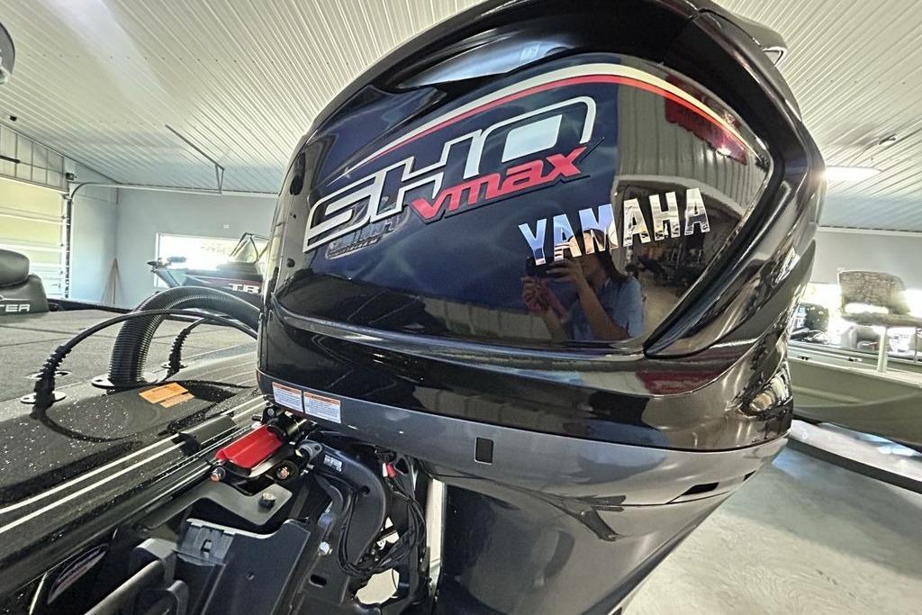 2026 Skeeter ZX200 with Yamaha SHO VMAX engine in a garage setting.