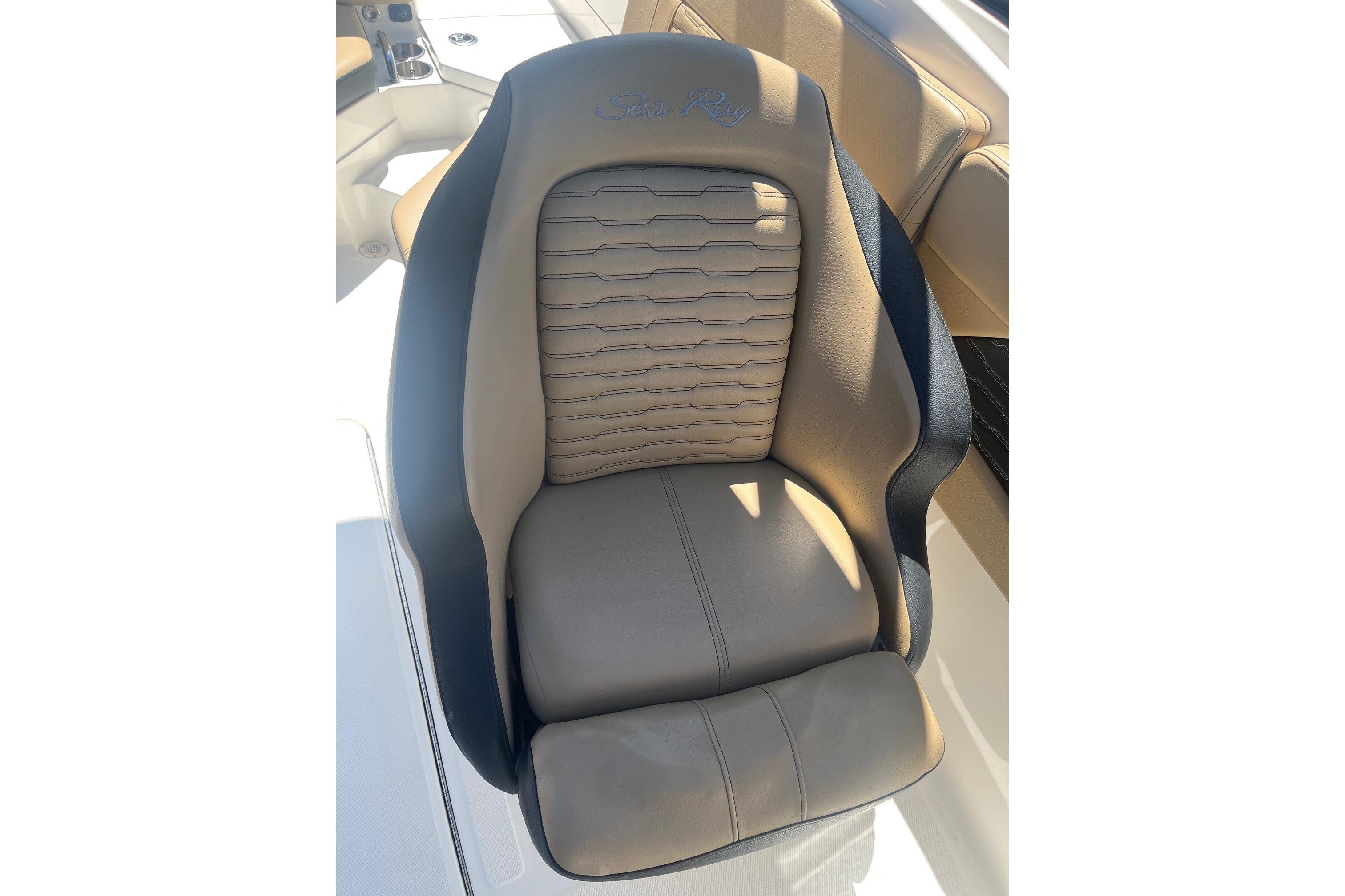 2024 Sea Ray SPX 230 boat seat with elegant beige and black design.