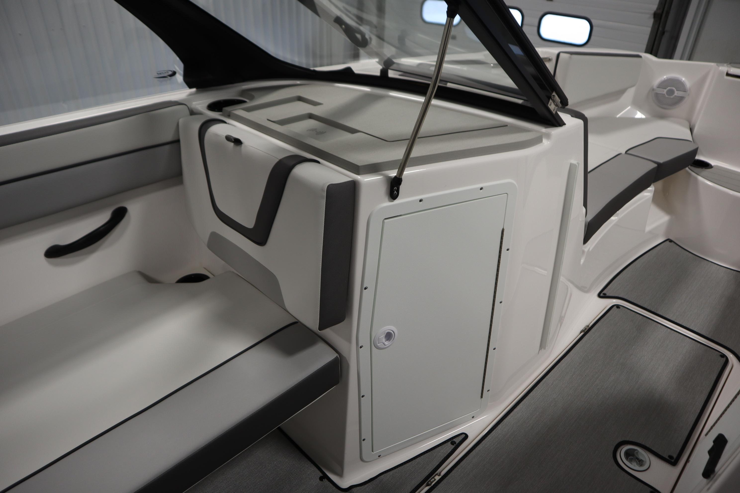 2026 Yamaha Boats AR220 interior seating and storage area, featuring sleek design and modern finishes.