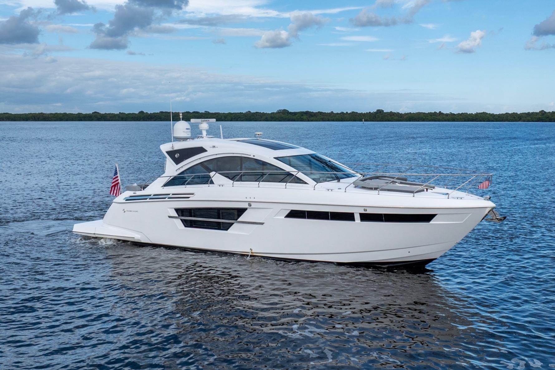 2022 Cruisers Yachts 54 Cantius luxury yacht cruising on open water.