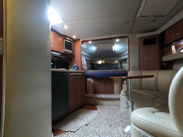 Interior of 2004 Chaparral Signature 350 yacht with cozy seating and modern amenities.
