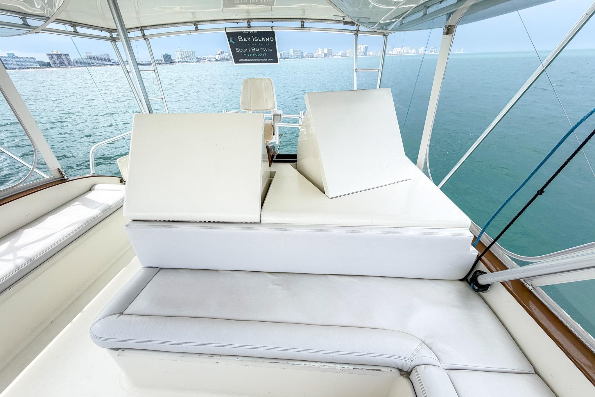 1998 Blackwell Custom Carolina Sportfish boat interior with white seating and ocean view.