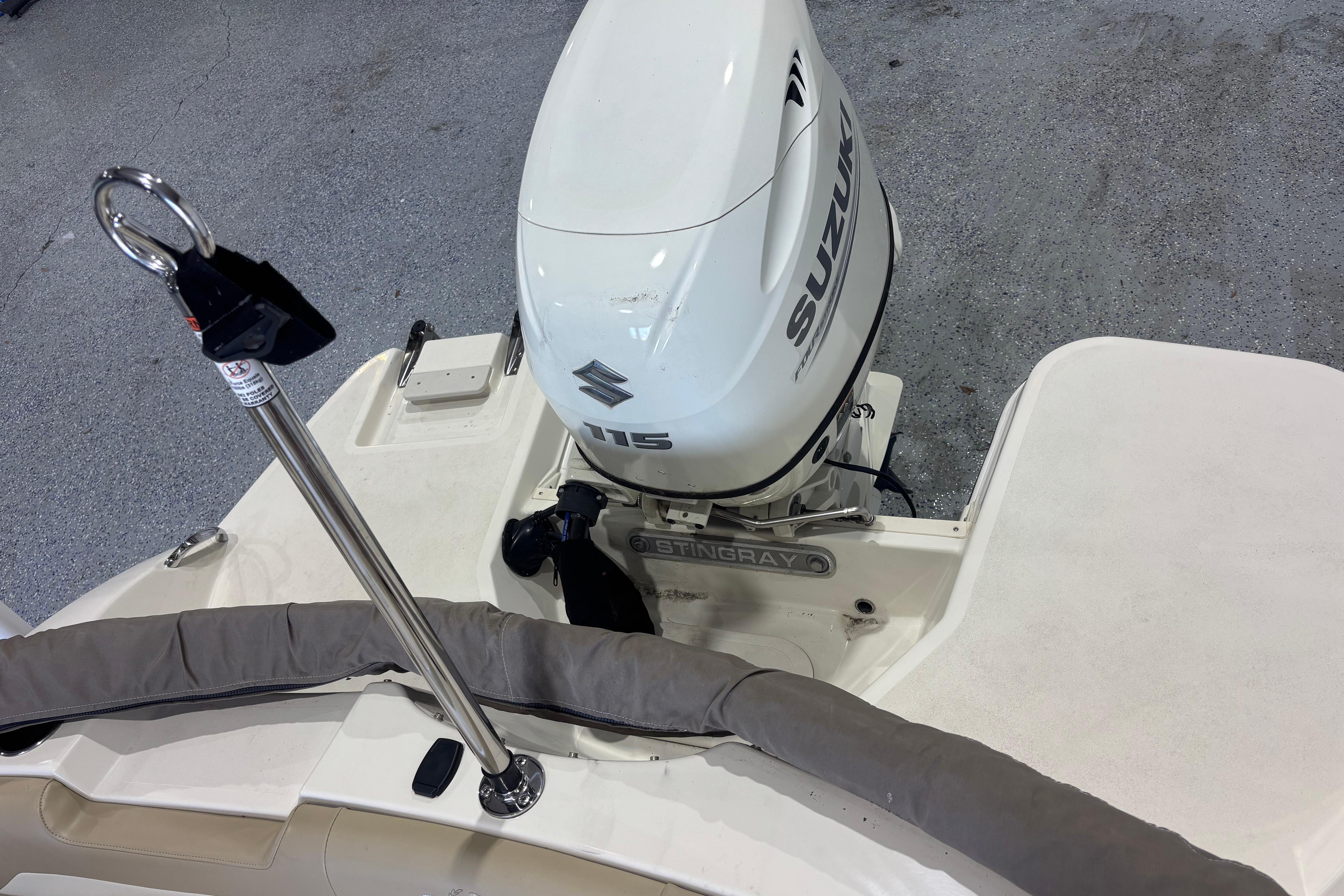 2017 Stingray 182 SC boat with Suzuki 115 outboard motor, rear view.