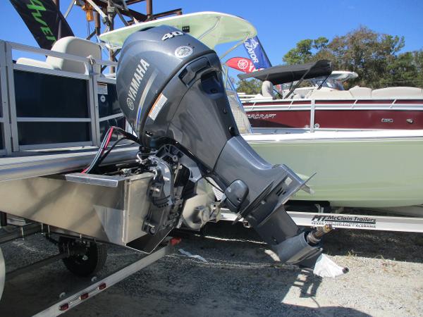 Yamaha outboard motor on 2025 Starcraft LX16R boat, docked outdoors.