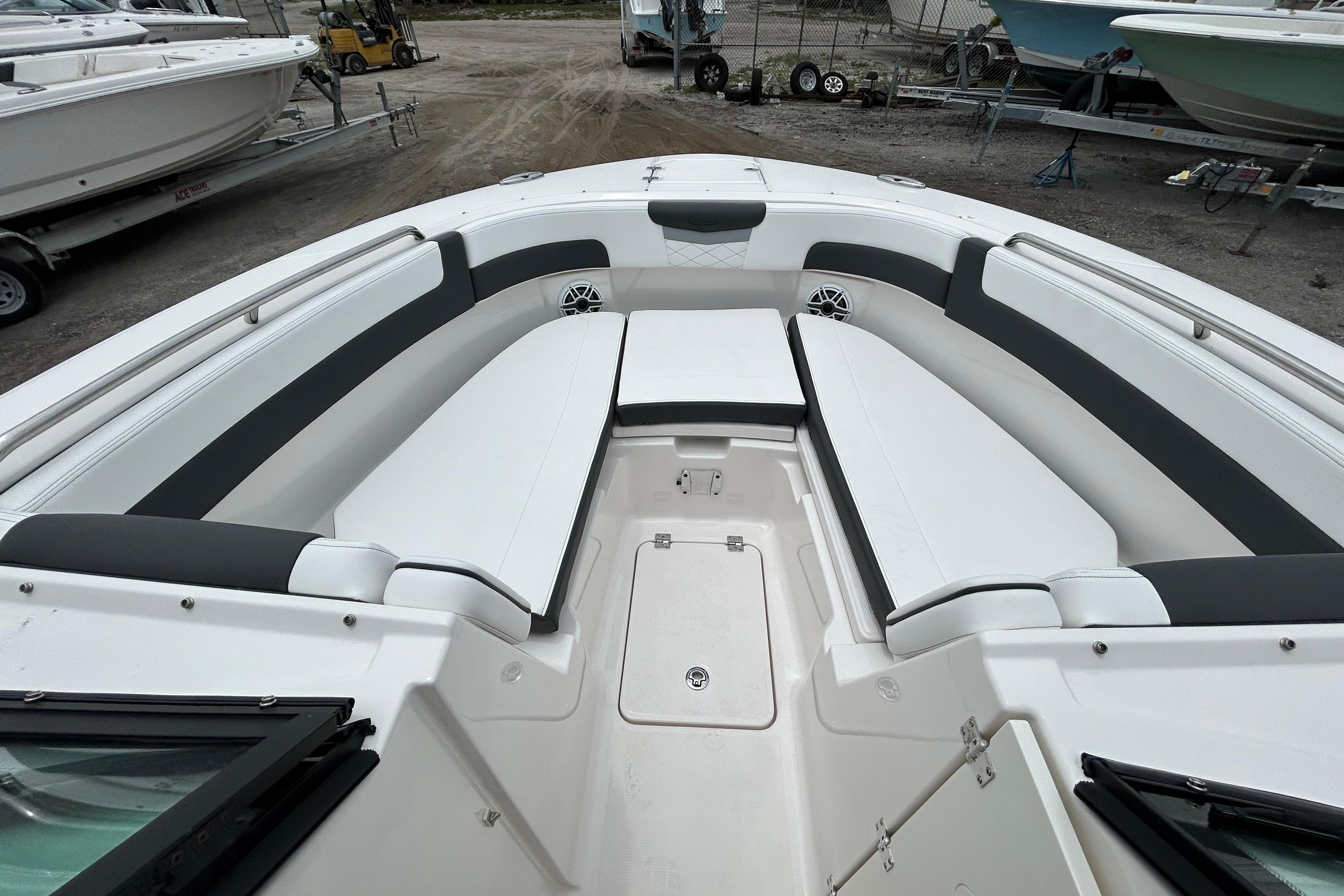 2026 Robalo R277 Dual Console boat interior with spacious seating and storage.