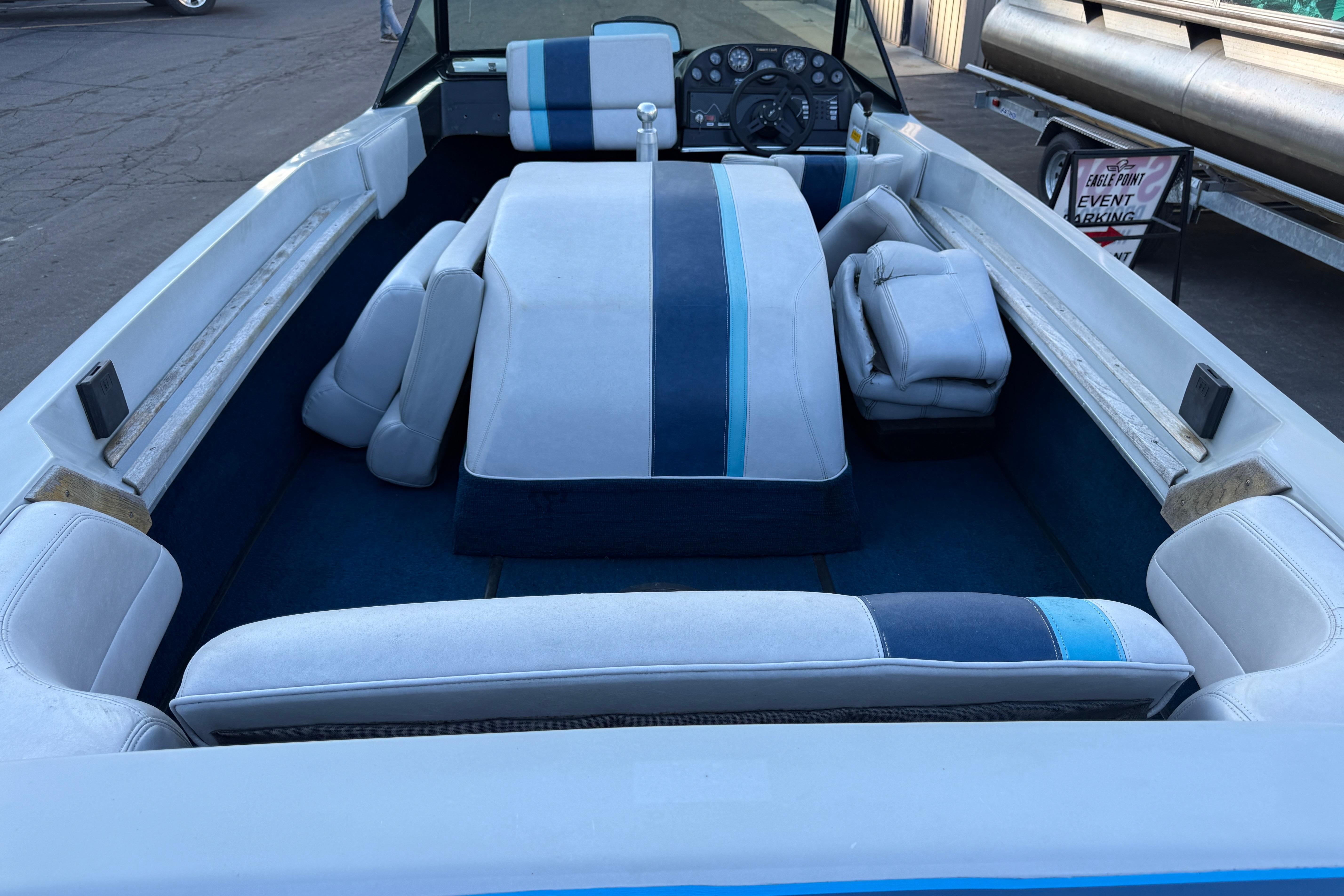 1989 Correct Craft Ski Nautique interior with blue and white upholstery.