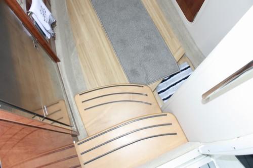 Interior of 2016 Formula 400 Super Sport yacht with wooden flooring.