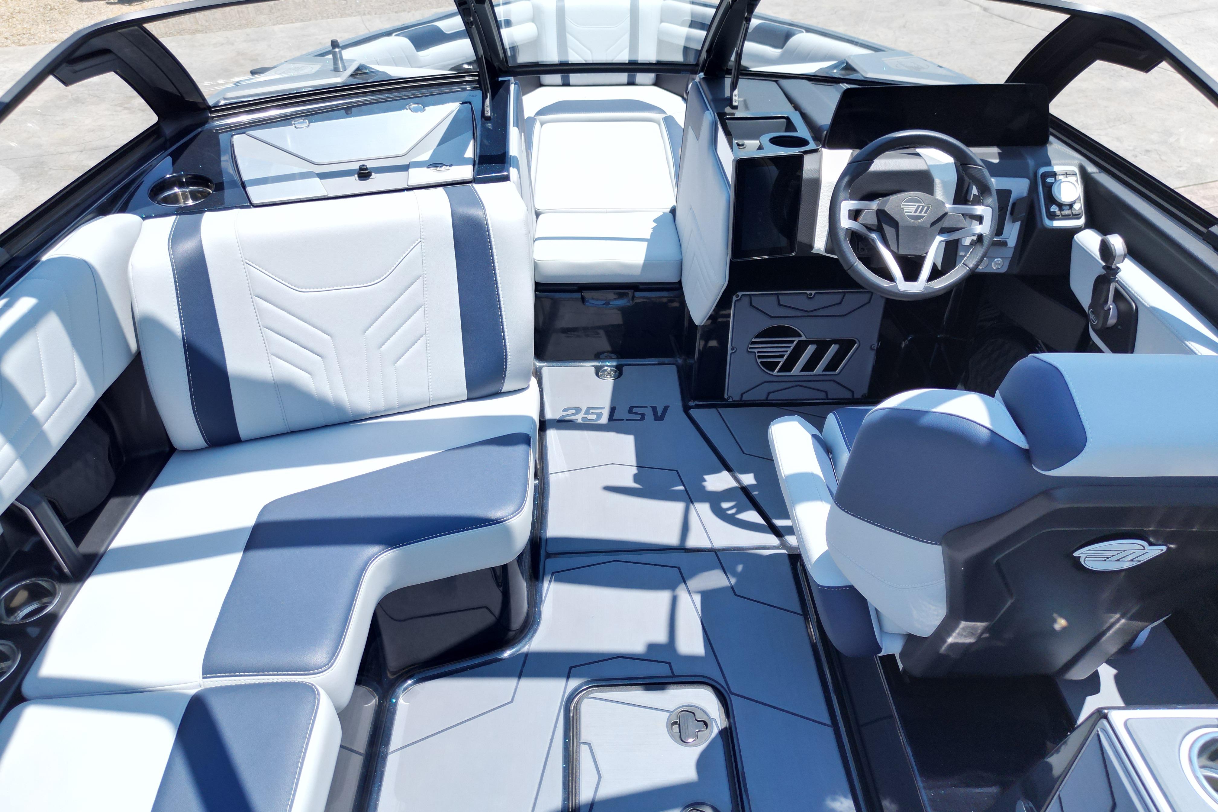 2025 Malibu Wakesetter 25 LSV interior with sleek seating and modern dashboard design.