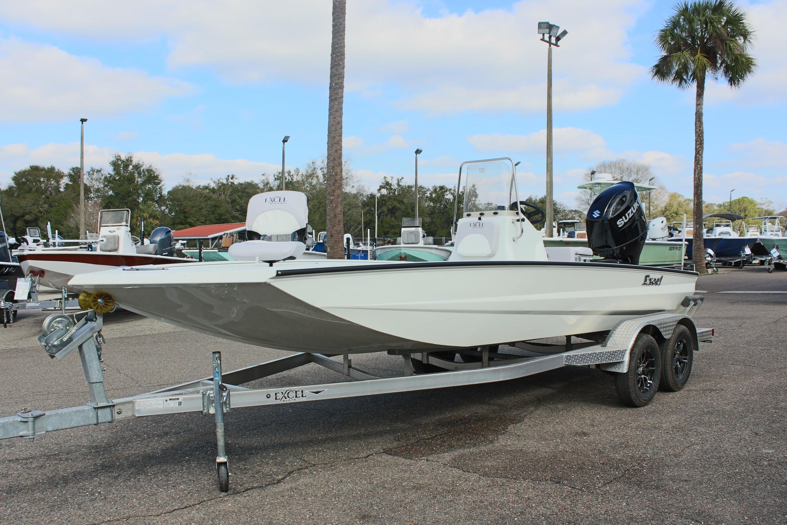 2025 Excel 2172 Stalker CC boat on trailer in outdoor showroom.