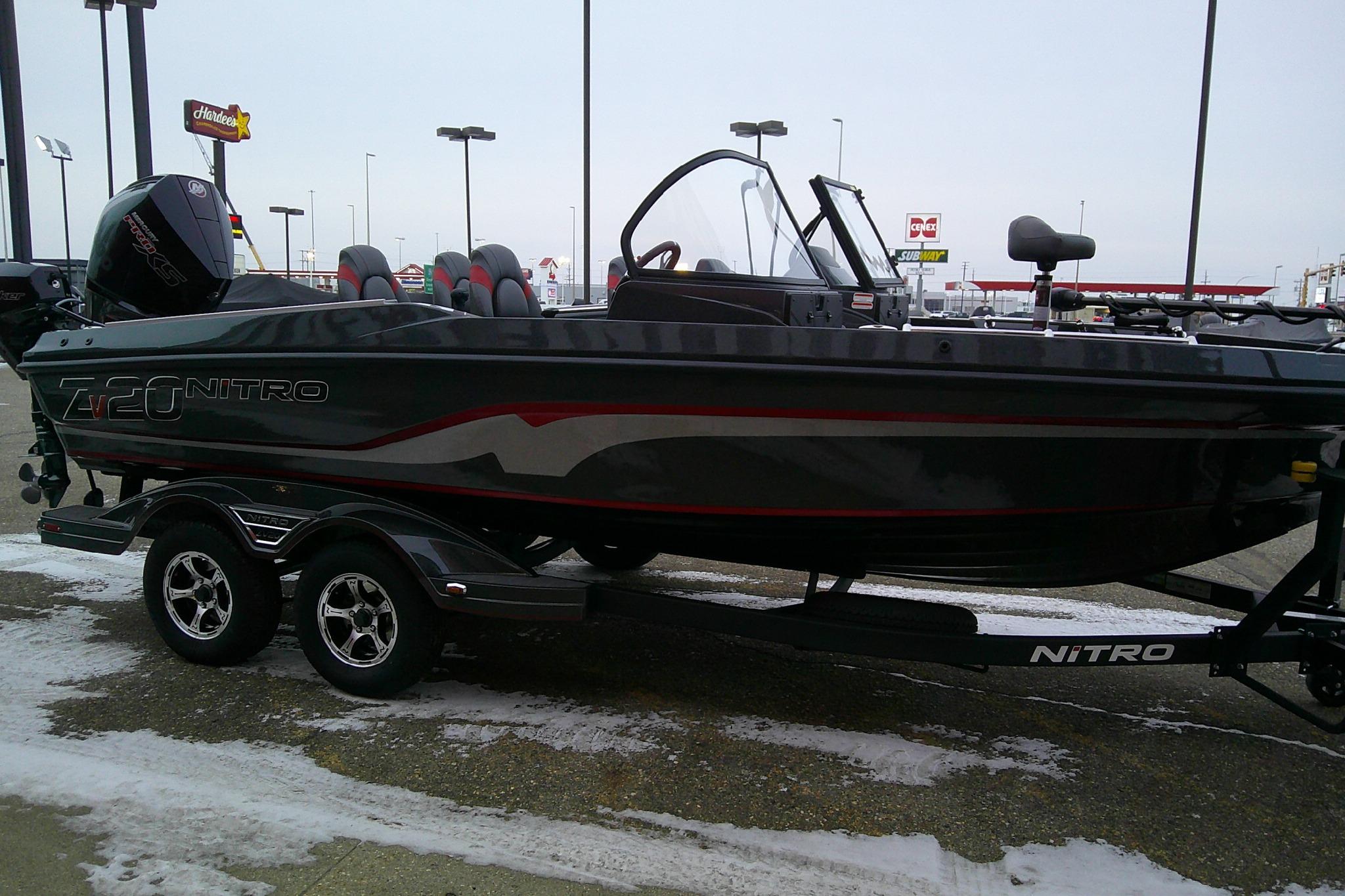 2026 Nitro ZV20 Pro boat on trailer in snowy parking lot.