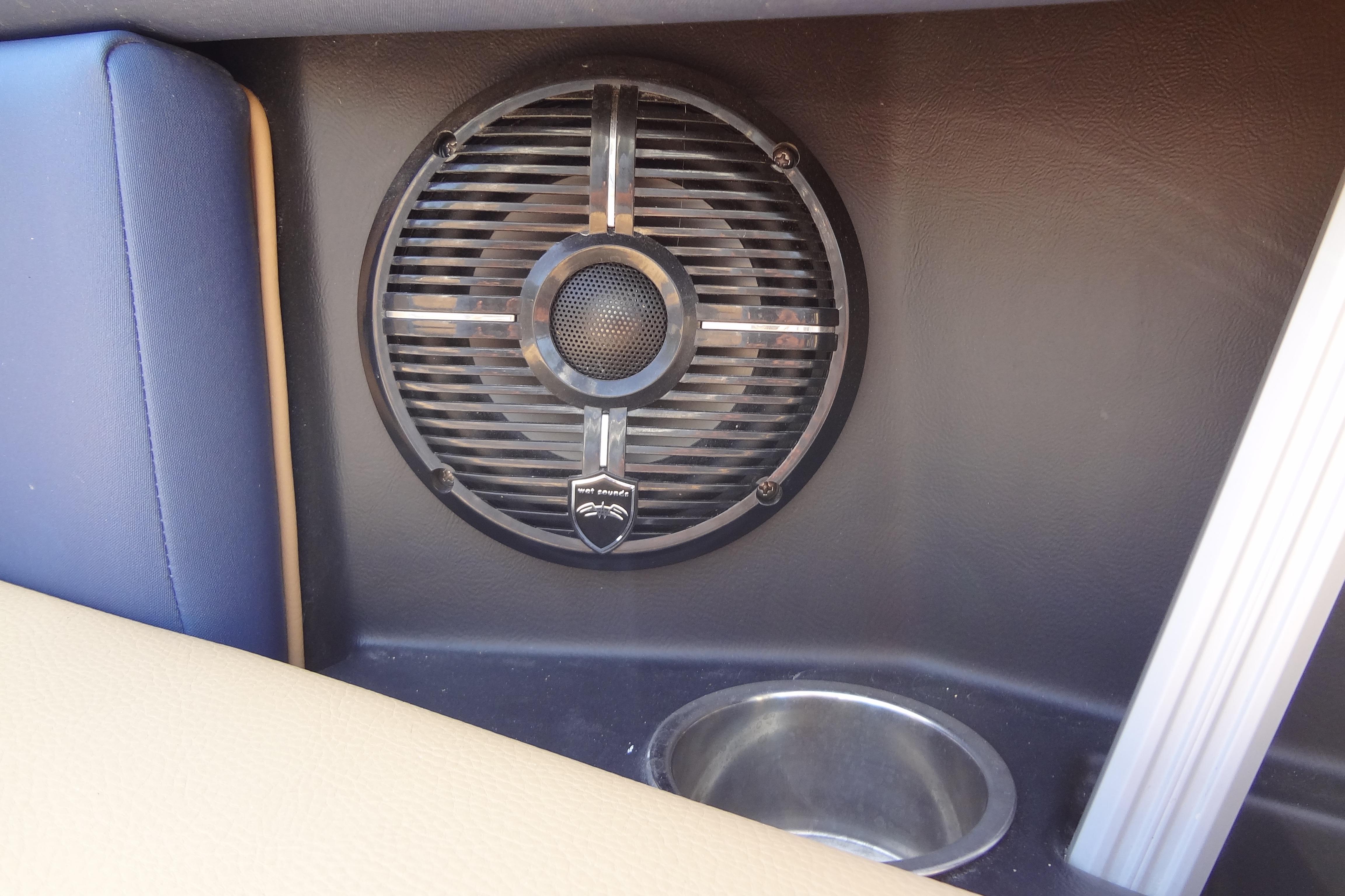 Speaker and cup holder in 2022 ATX Surf Boats 24 Type-S interior.