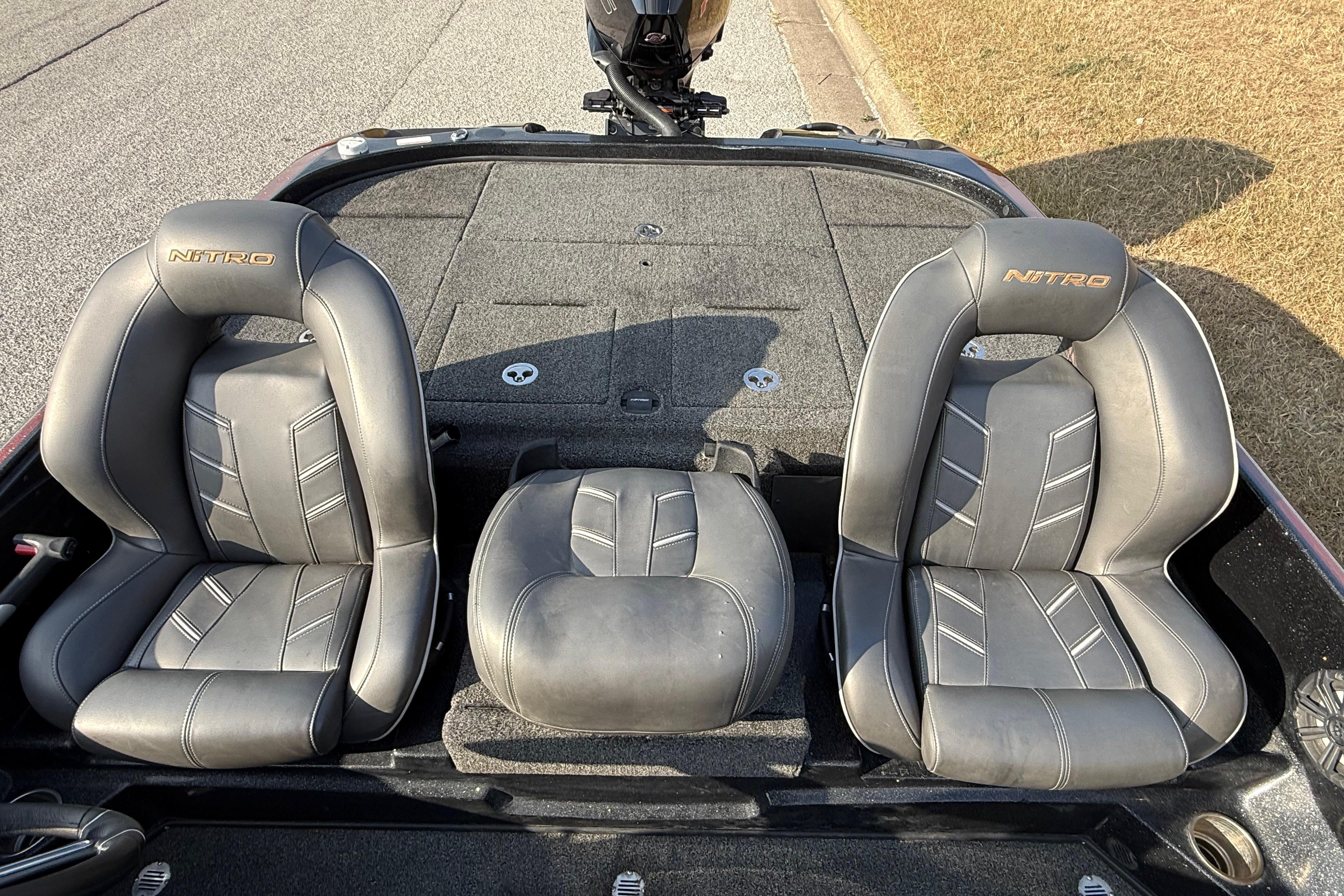 2019 Nitro Z21 Pro boat seats, gray leather, embroidered logo, outdoor setting.