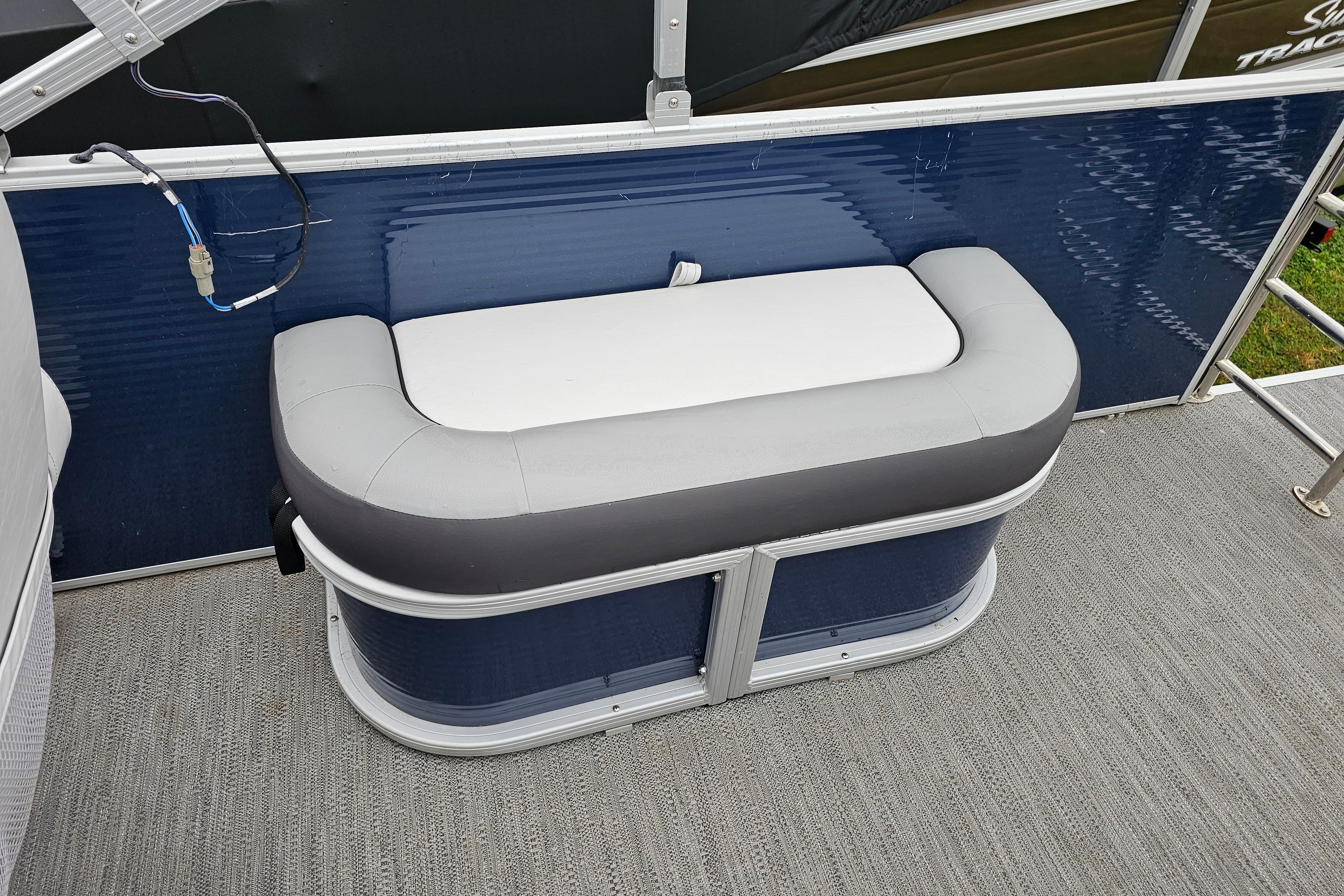 2022 Sweetwater 2286 SFL boat seat with blue and gray upholstery.