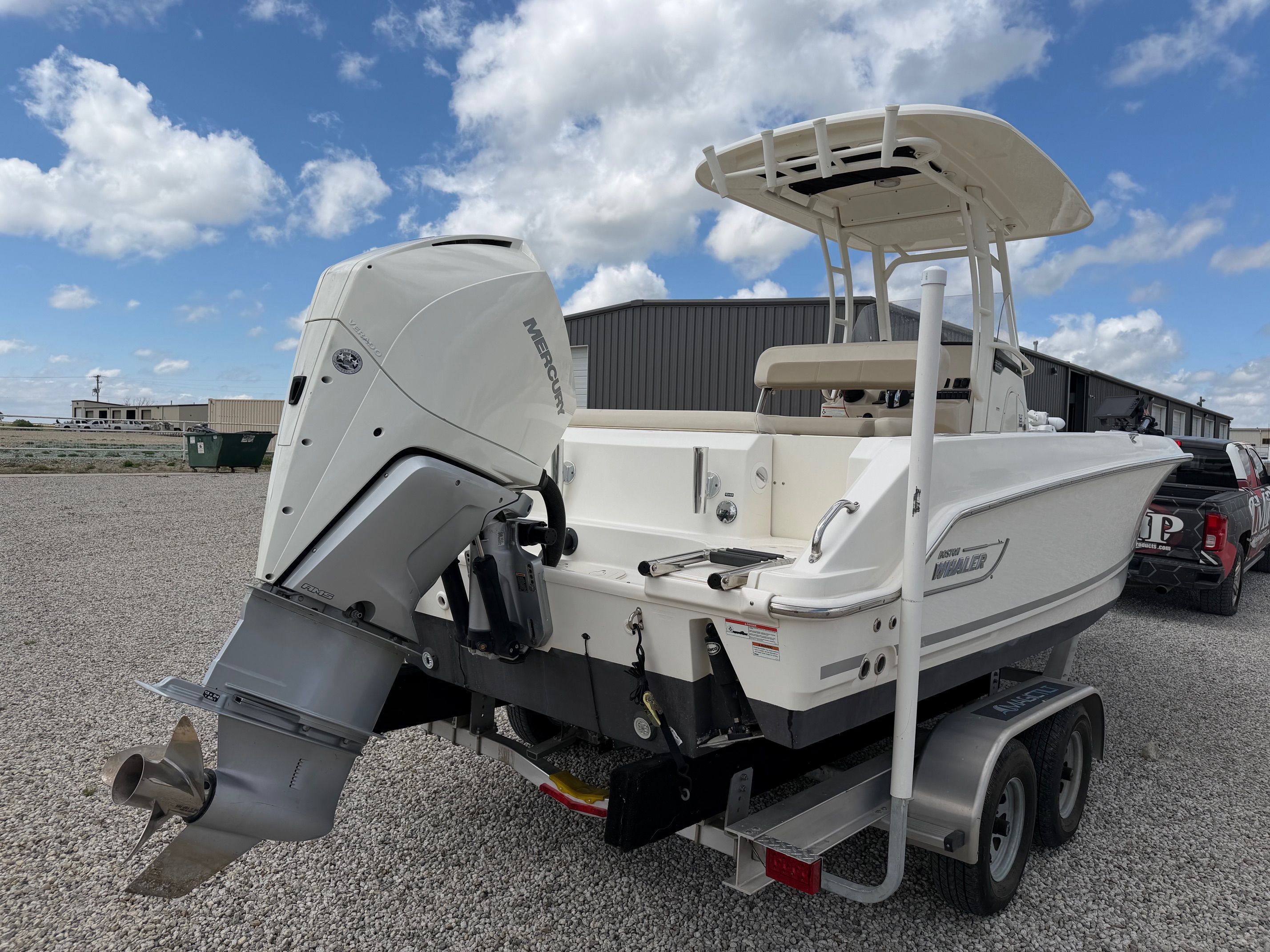 Boston Whaler 230 Outrage 2020 on trailer, exterior view.