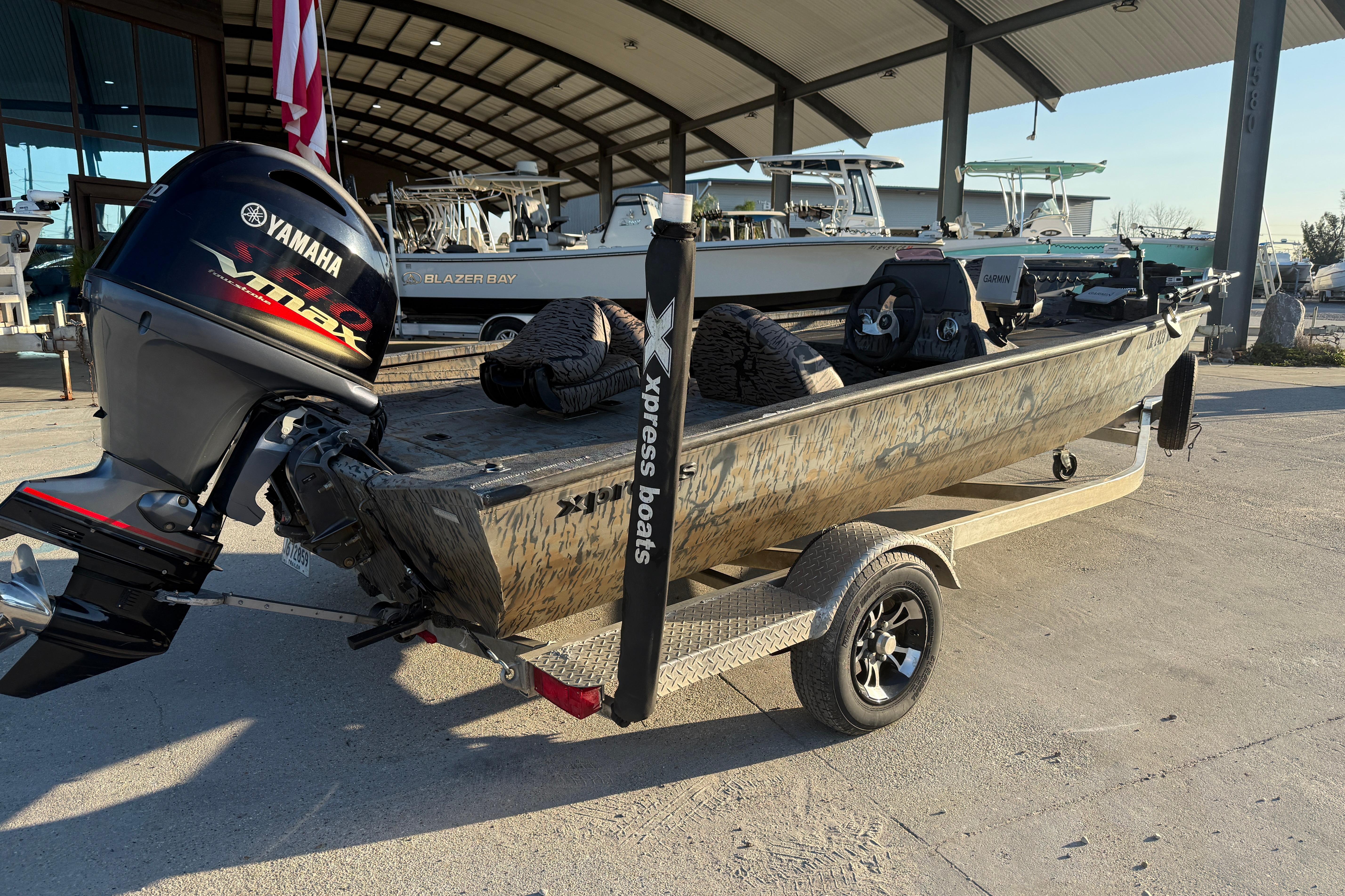 2019 Xpress XP7 boat with Yamaha VMAX engine on a trailer.