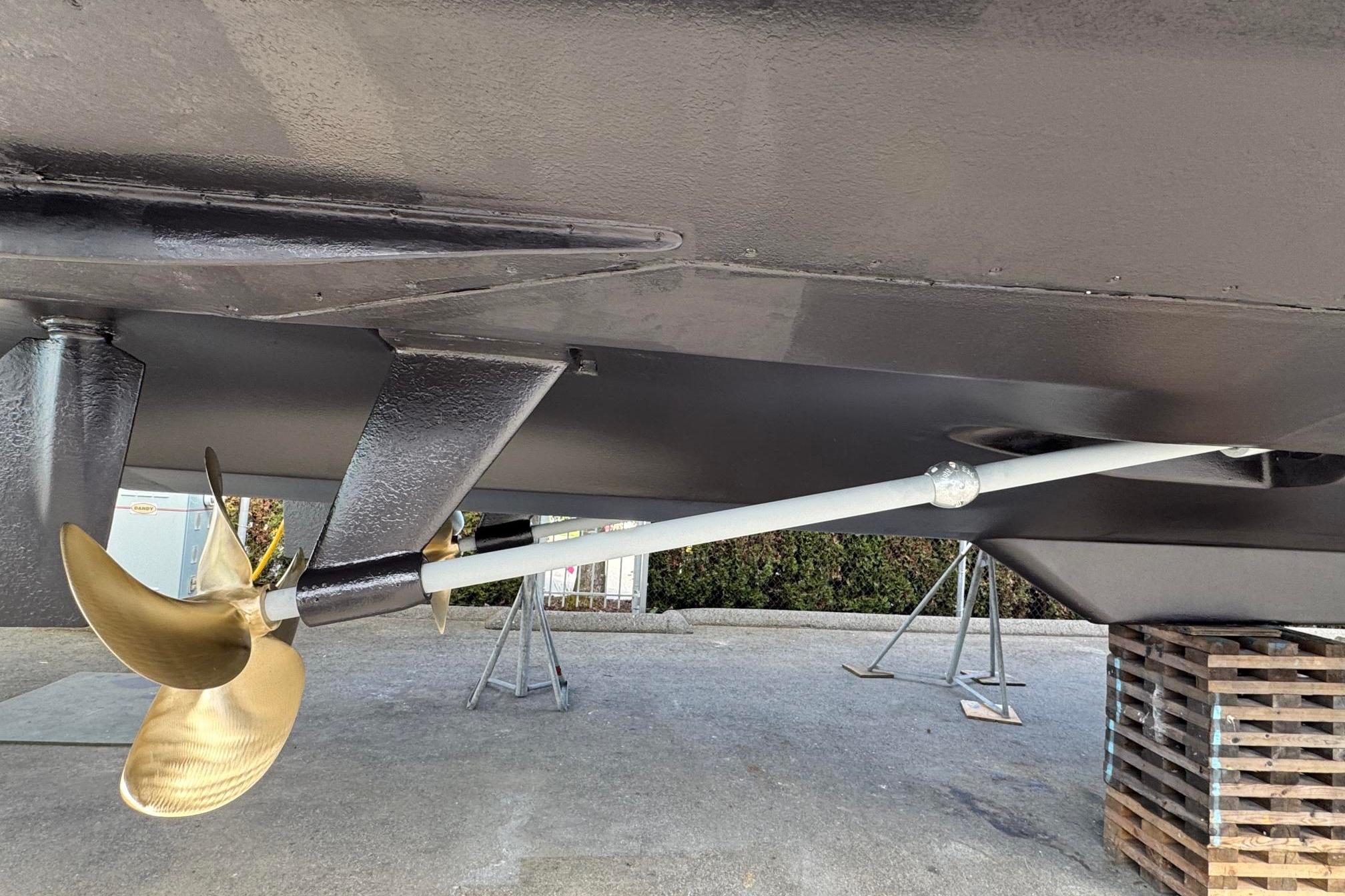 Underside view of 2006 Riviera 47 Open Flybridge Series II with propeller and shaft.