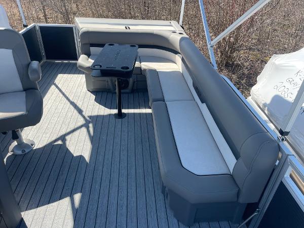 2025 Armada Saphir 23CR boat interior with gray seating and table on deck.