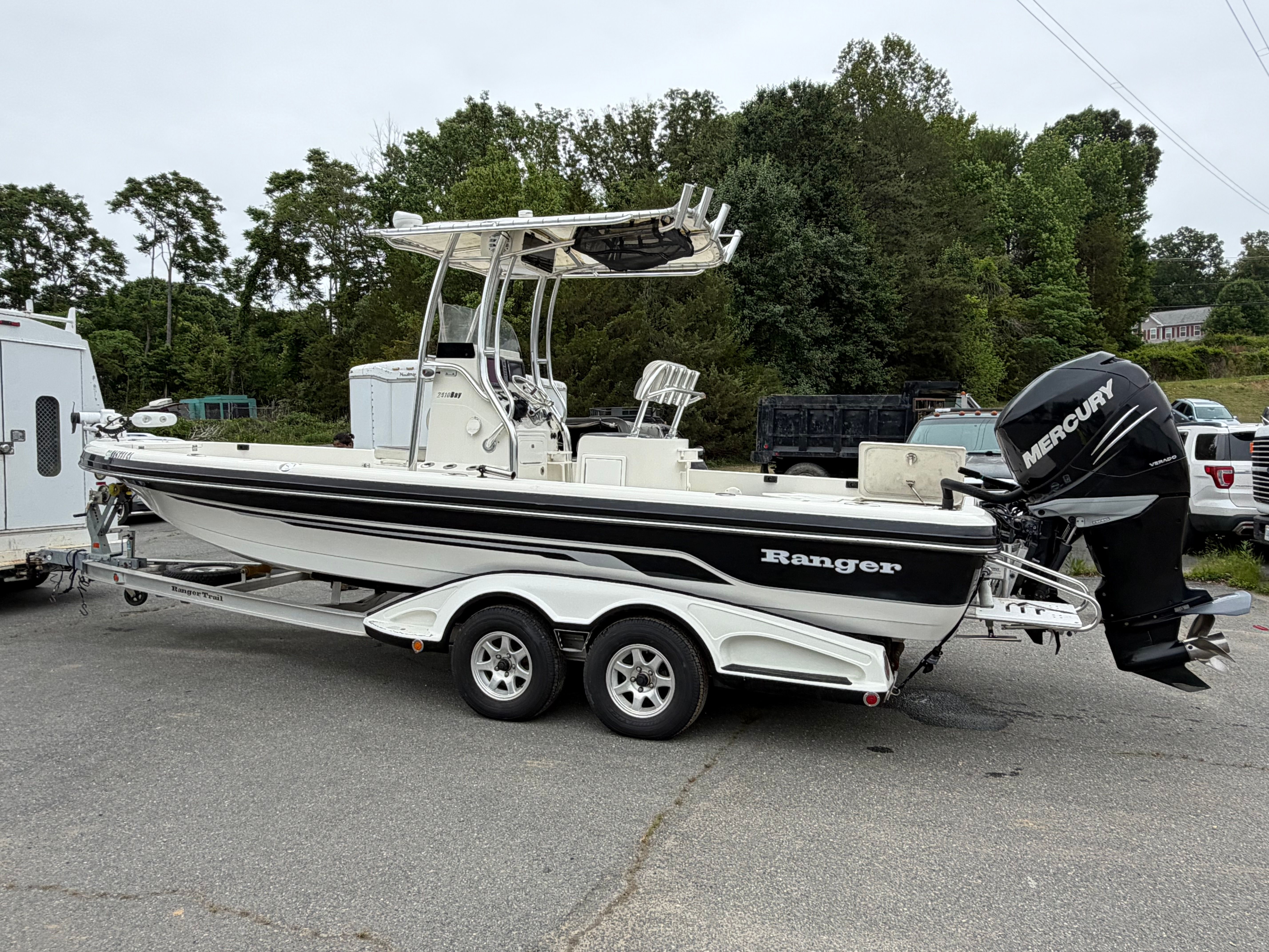 2008 Ranger 2400 Bay Ranger boat parked on trailer outdoors.