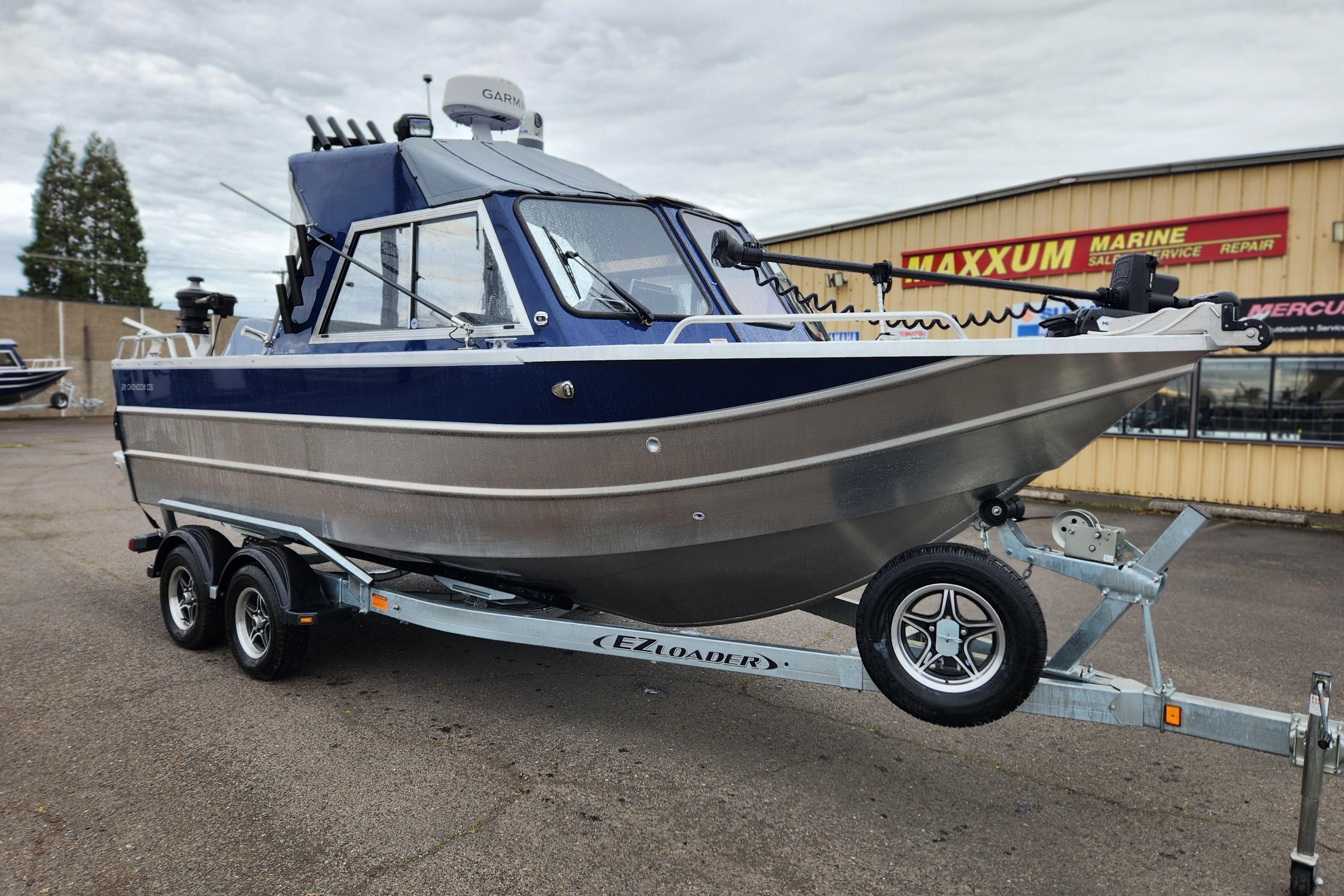 2025 Thunder Jet 21 Chinook OS boat on trailer at Maxxum Marine dealership.