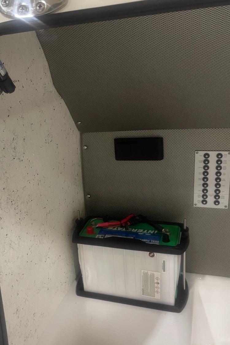 Battery compartment of a 2025 Hustler 25 C3 Speedfish boat.