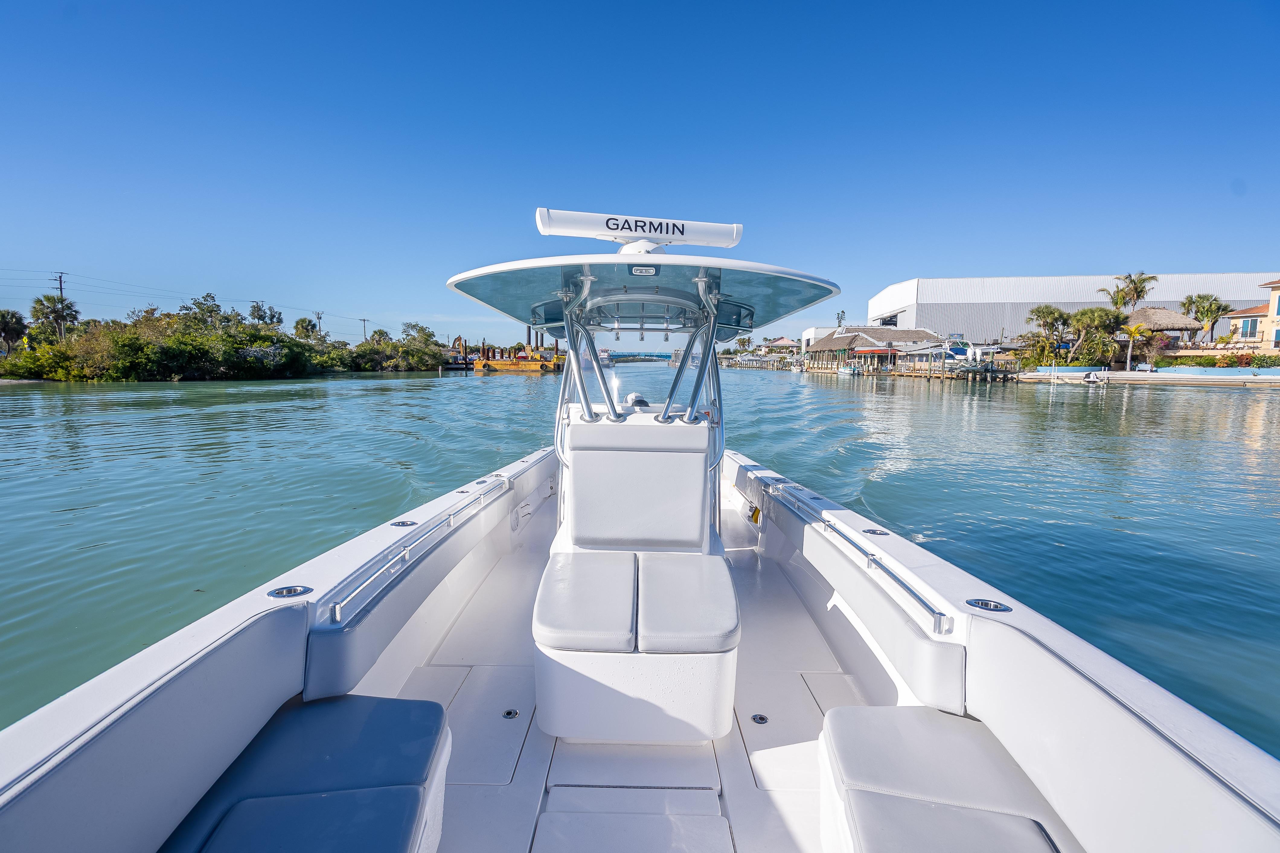 2026 Contender 35 ST boat on calm water, featuring Garmin navigation system.