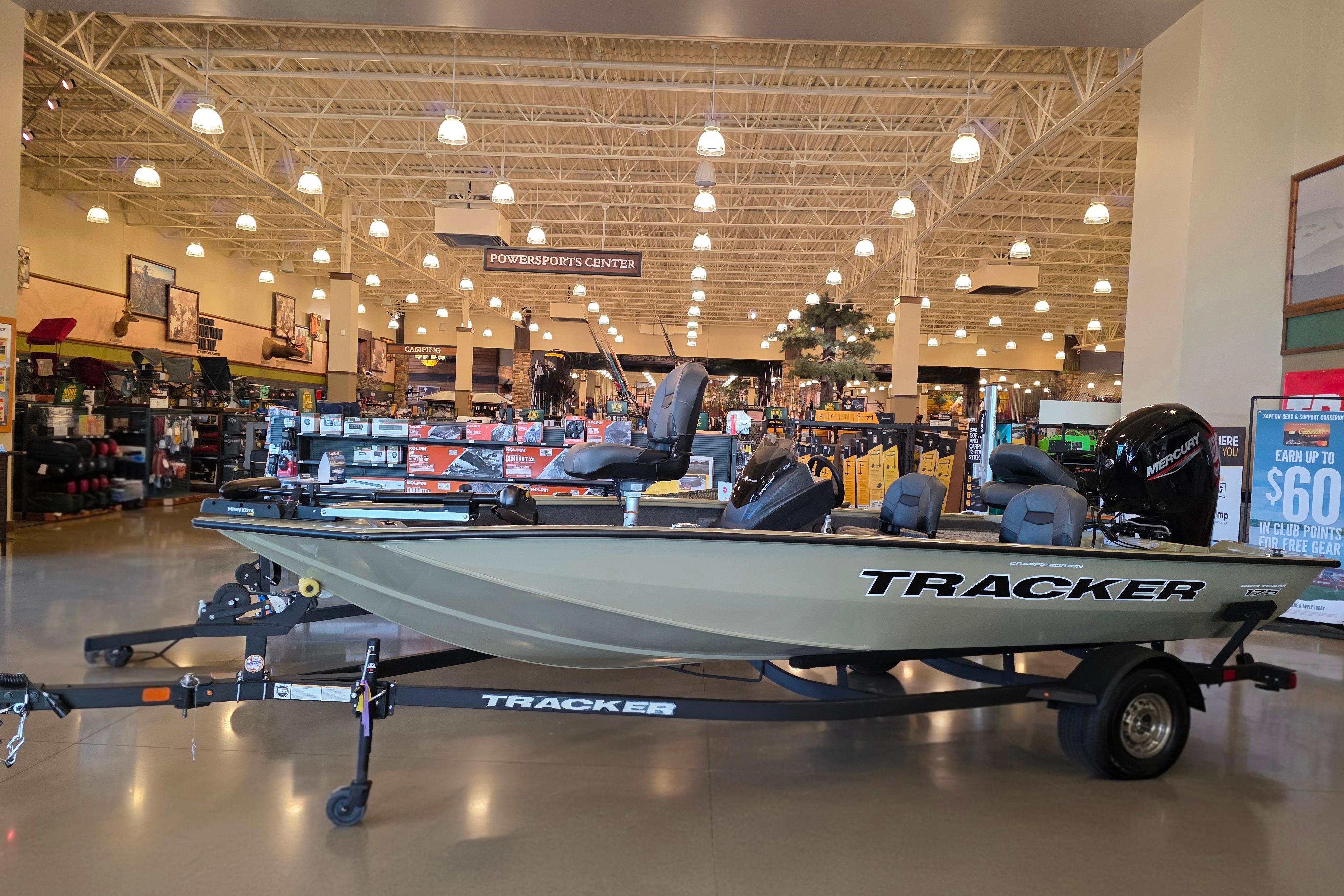 2026 Tracker Pro Team 175 Crappie Edition boat displayed in a showroom.