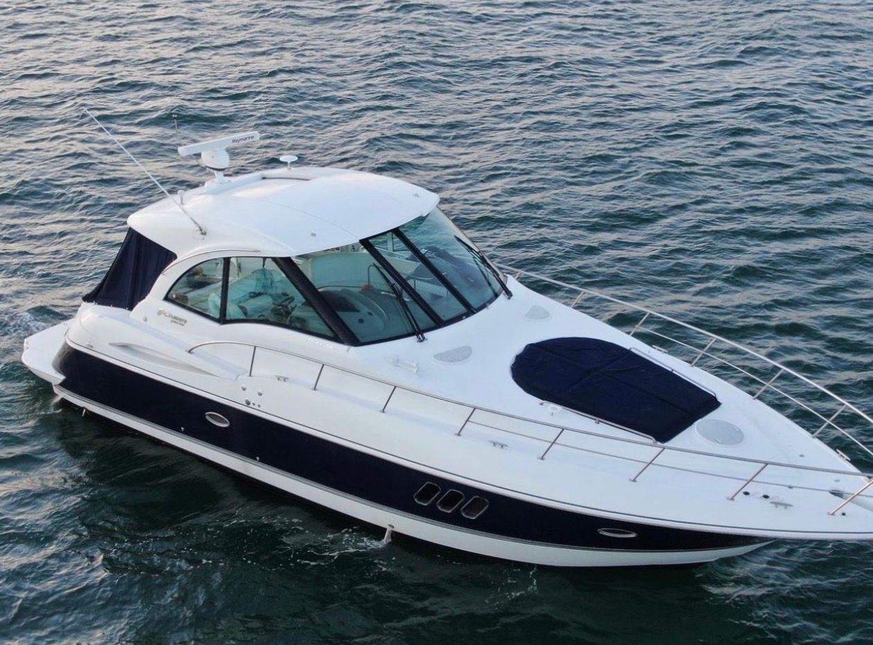 2012 Cruisers Yachts 430 Sports Coupe on calm waters.