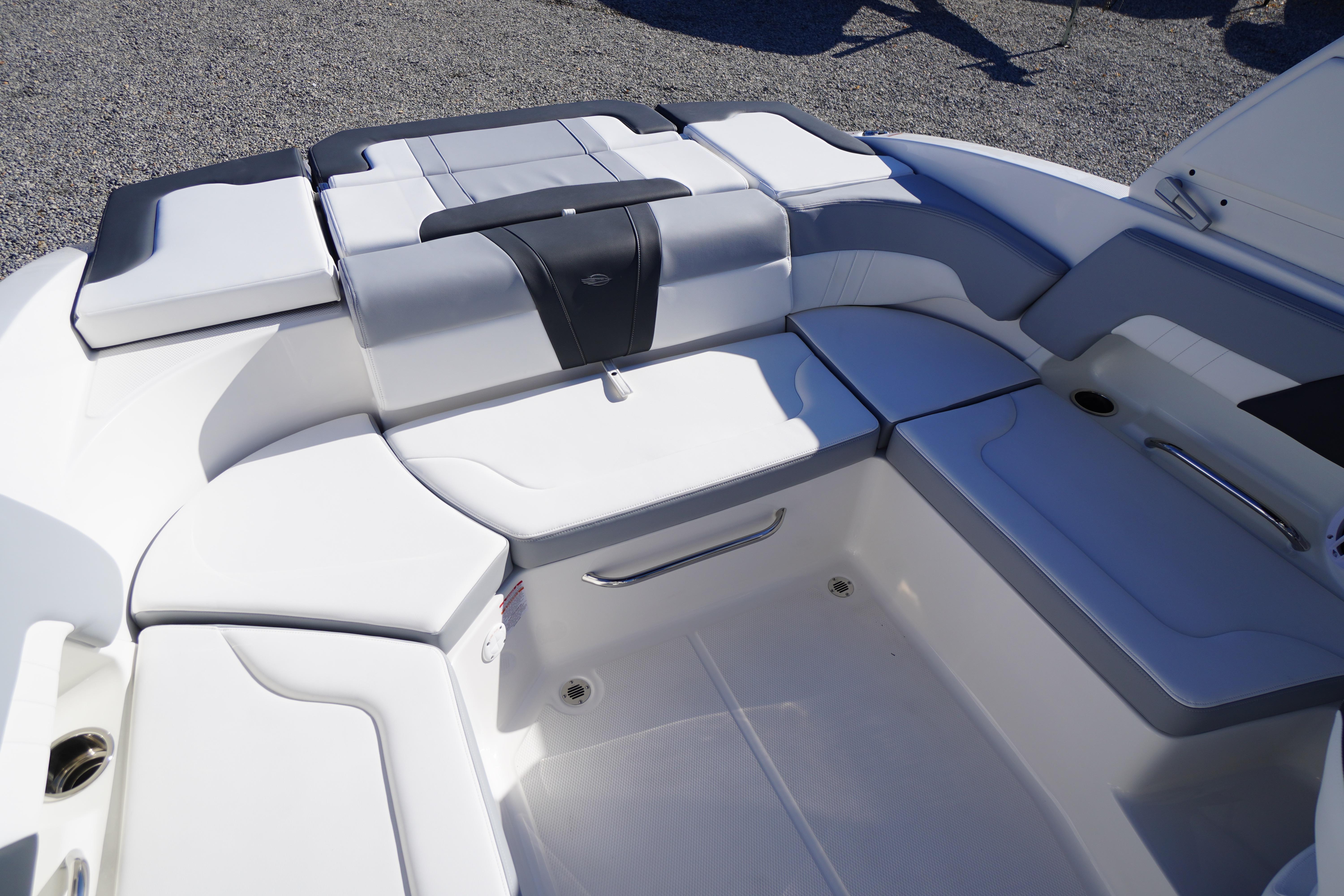 2026 Chaparral 23 SSi boat interior with sleek white seating and modern design.